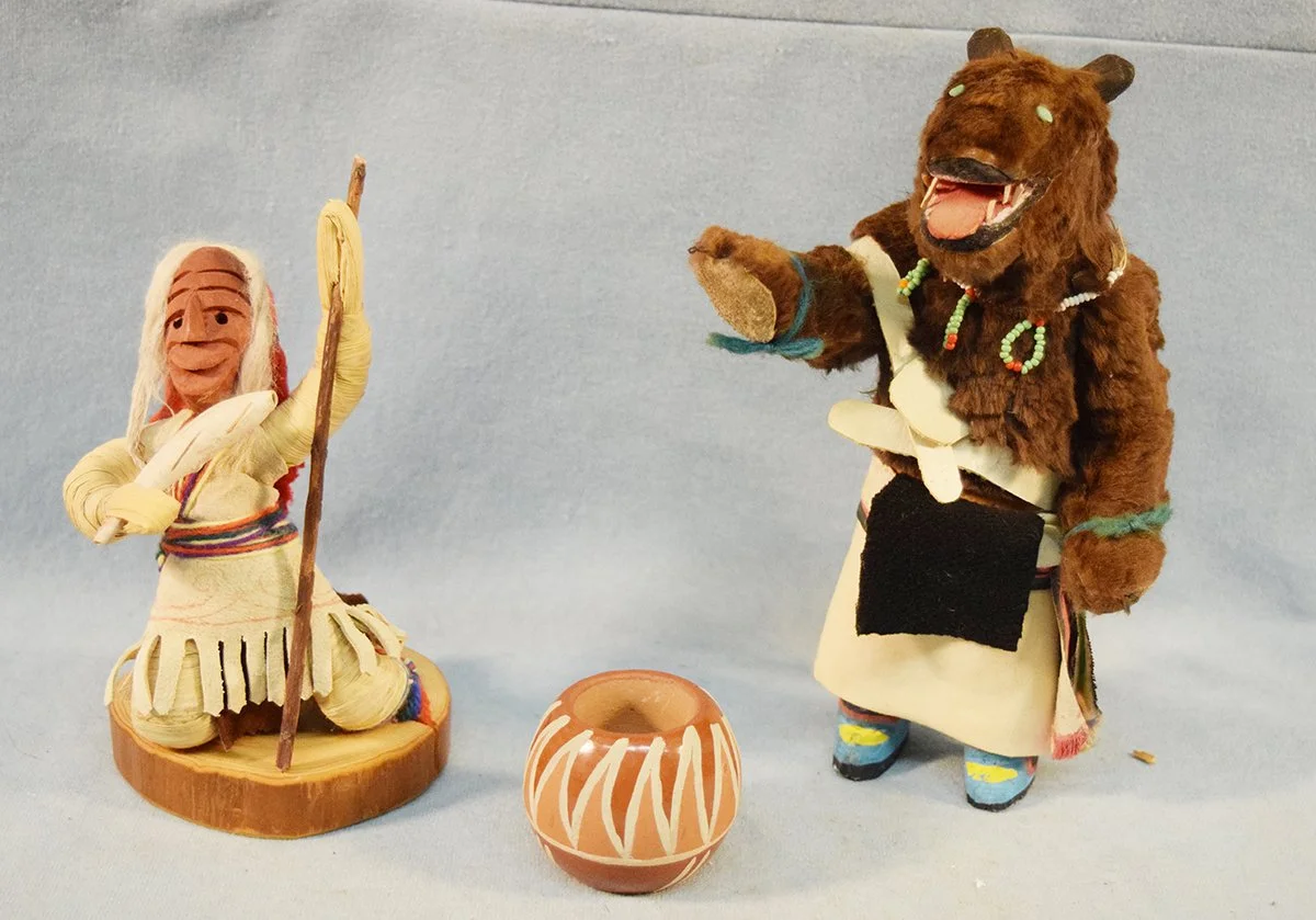 3 pcs: Bear Kachina, 8" tall, unsigned, circa 1950; Iroquois Doll, 6" tall " x on wooded base, unsigned, circa 1970; Santa Clara Pueblo pot, 1.75" x 2.25", signed Myra, Santa Clara Pue.