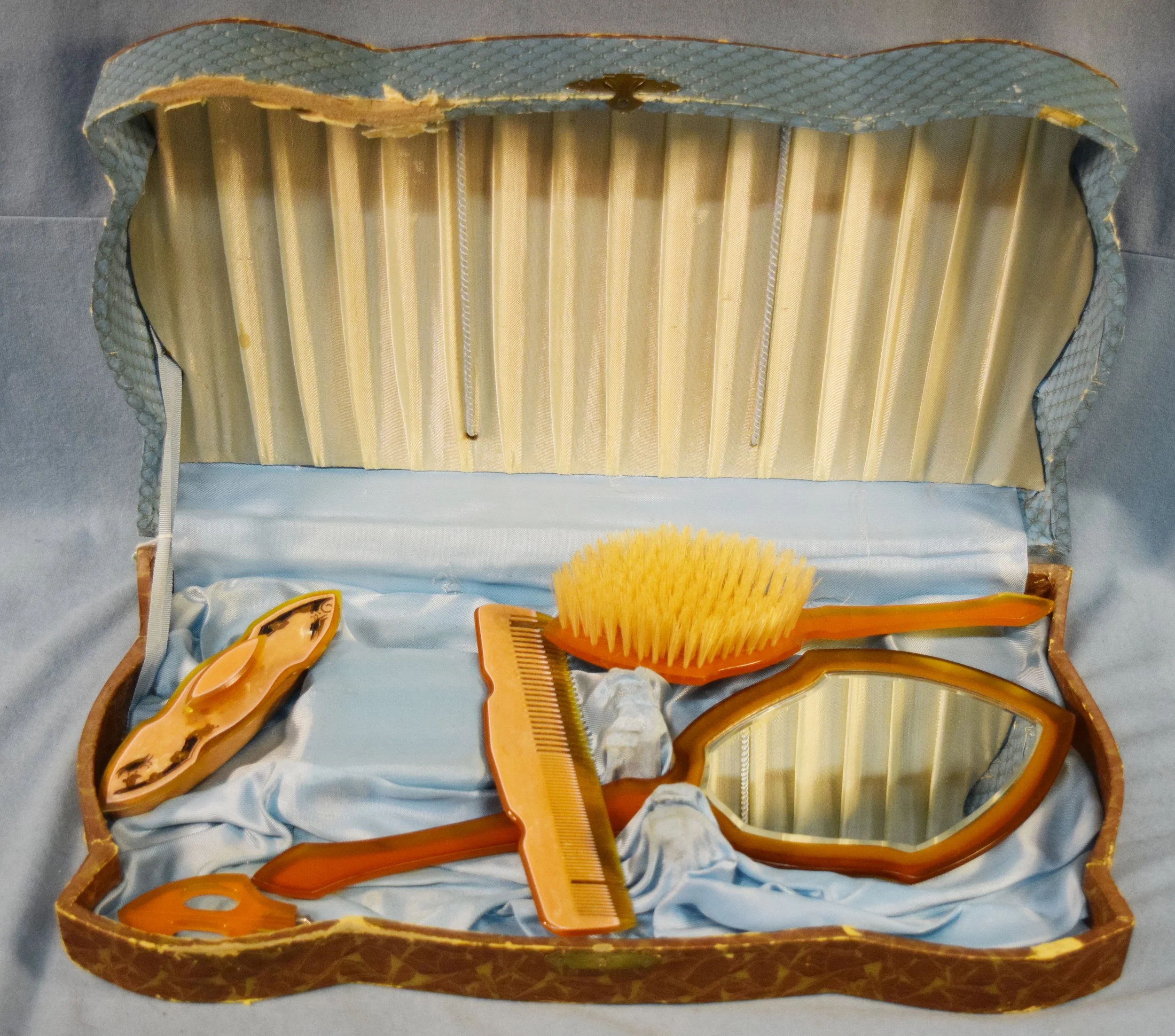 Vintage celluloid ladies hair care set: brush, comb, scissors & mirror, all in original case