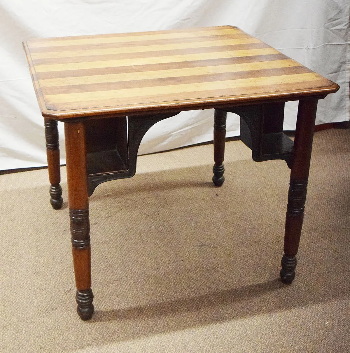 Emil Puchta, Washington, Missouri, saloon style card table with cast iron frame drink holders, patented Feb. 15, 1881. 35" x 36", 30" tall
