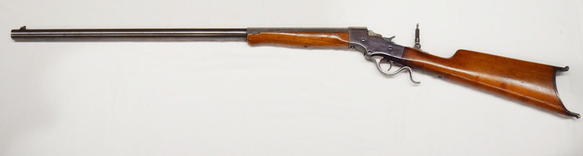 Stevens single shot rifle, peep sight, 28" round bbl, s#2819, Pat 1894, lever action, small crack in foregrip wood, per serial number appears to be a Stevens Favorite, produced late 19th/early 20th century
