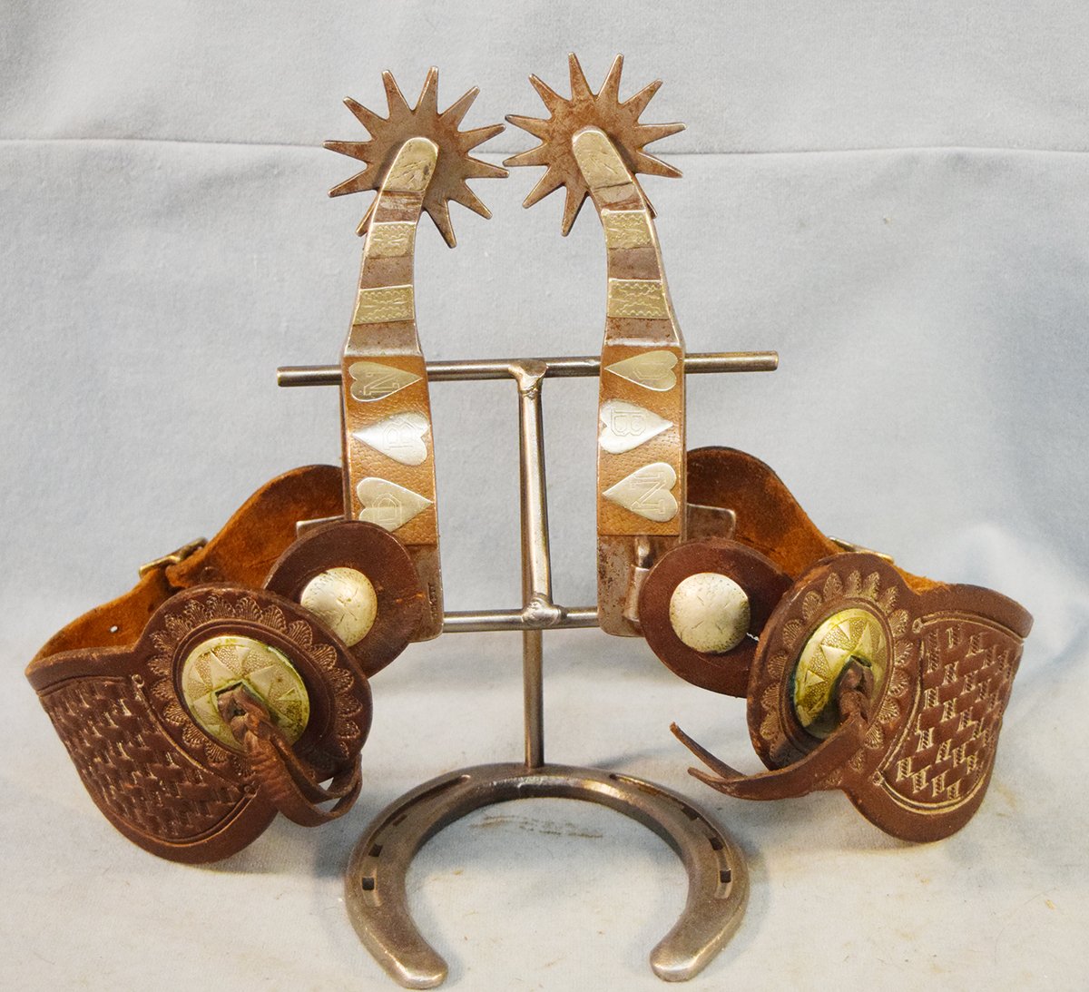 Crockett heart spurs w/brass background, cowhead straps, nice rowels
