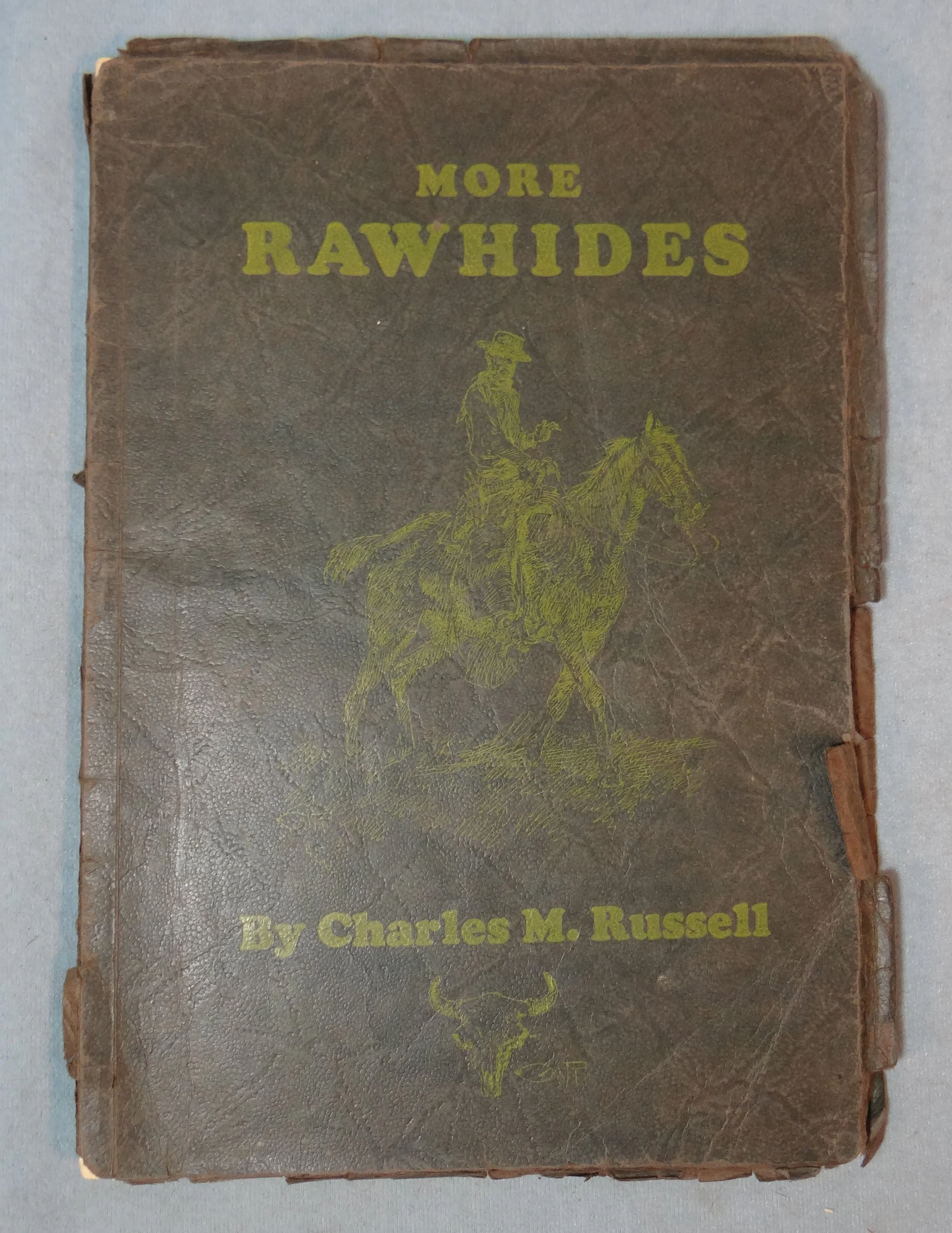 Russell, C.M., More Rawhides, signed by CMR on title page, original soft cover

