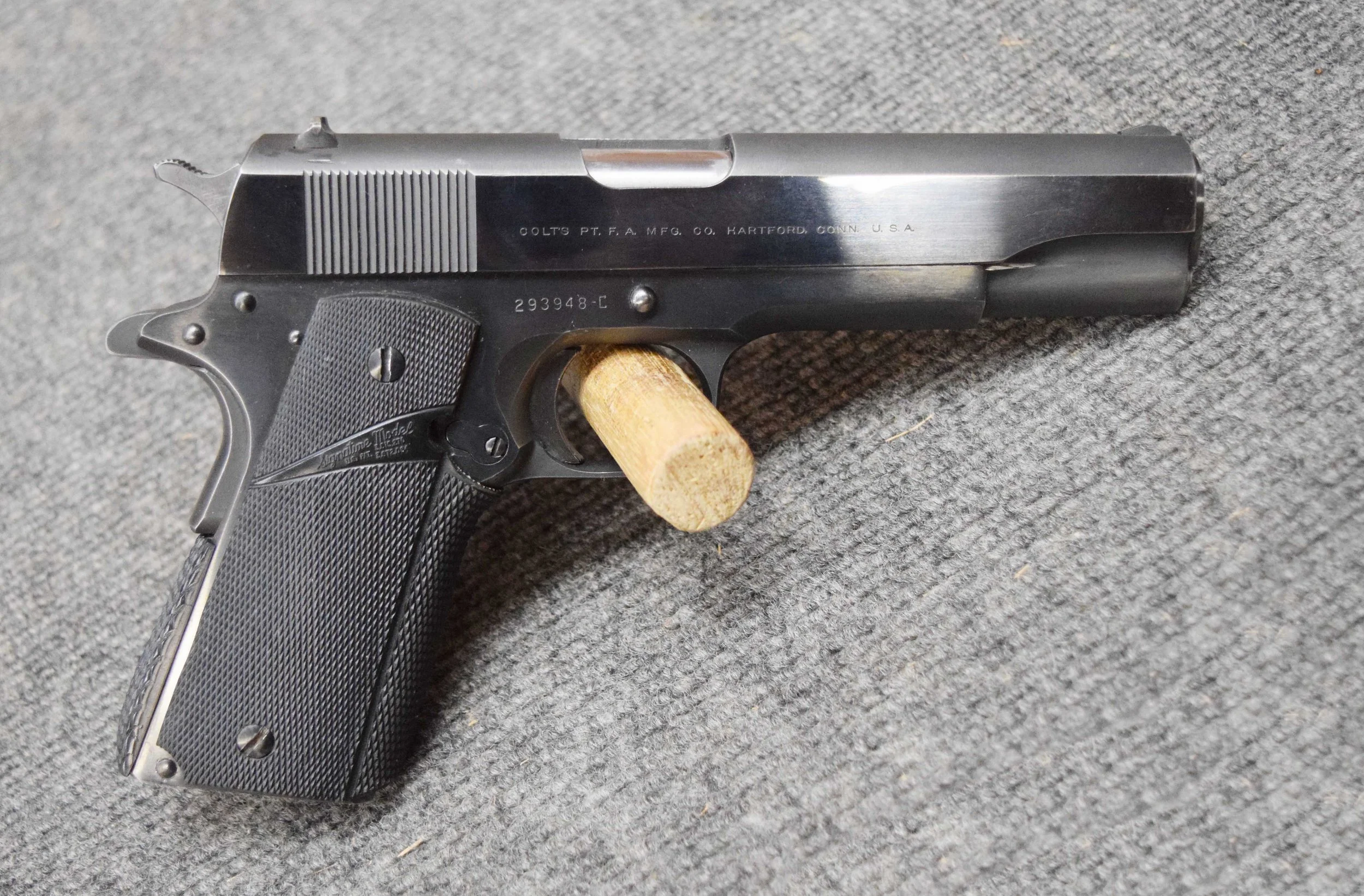 Colt Government 1911A1 semi-auto pistol, .45, s# 293948C, a gift from father on SMS high-school graduation