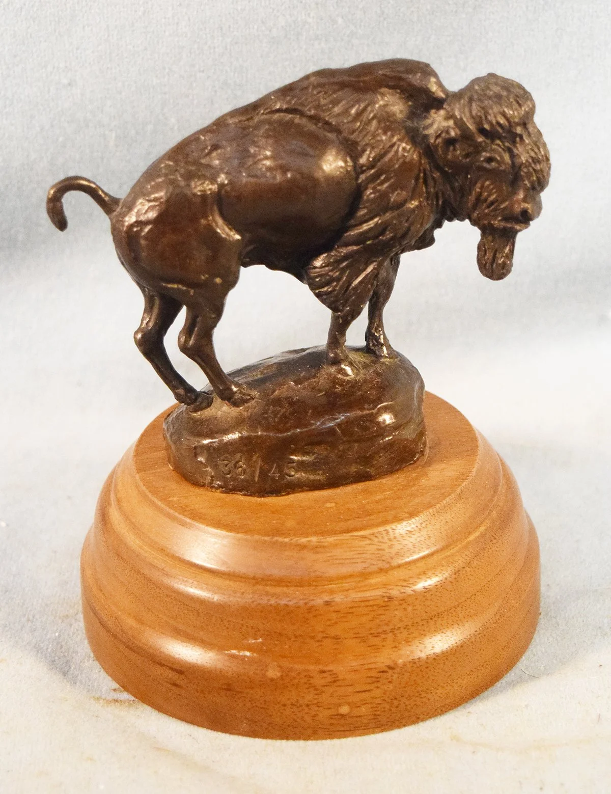 Cheek, C. R., bronze, Buffalo, #36/45, 4"  x 4½"  x 2", wood base

