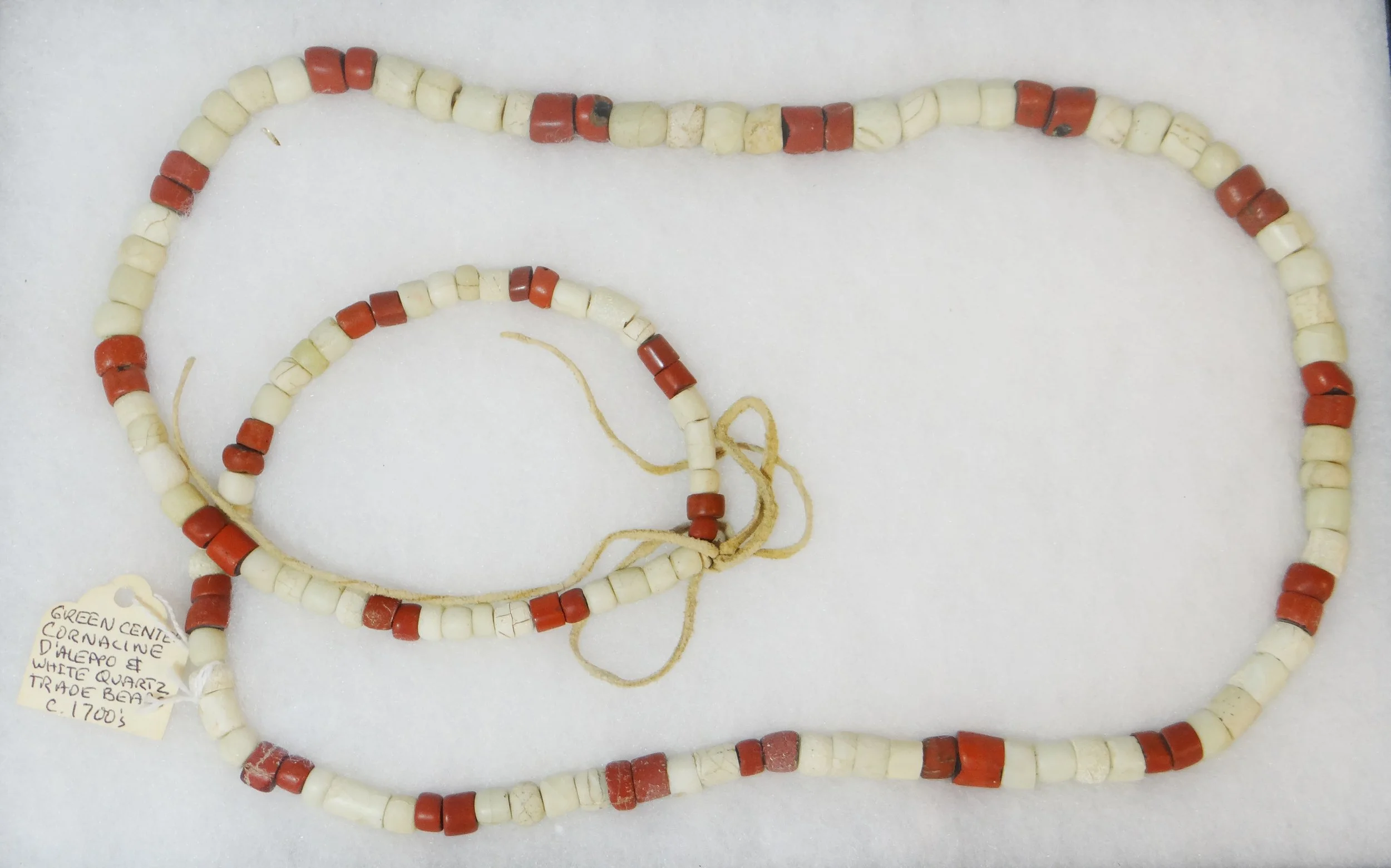 Native American Artifact Case: Indian trade beads, ca. 1700's green center cornaline D'Allepo & white quartz
