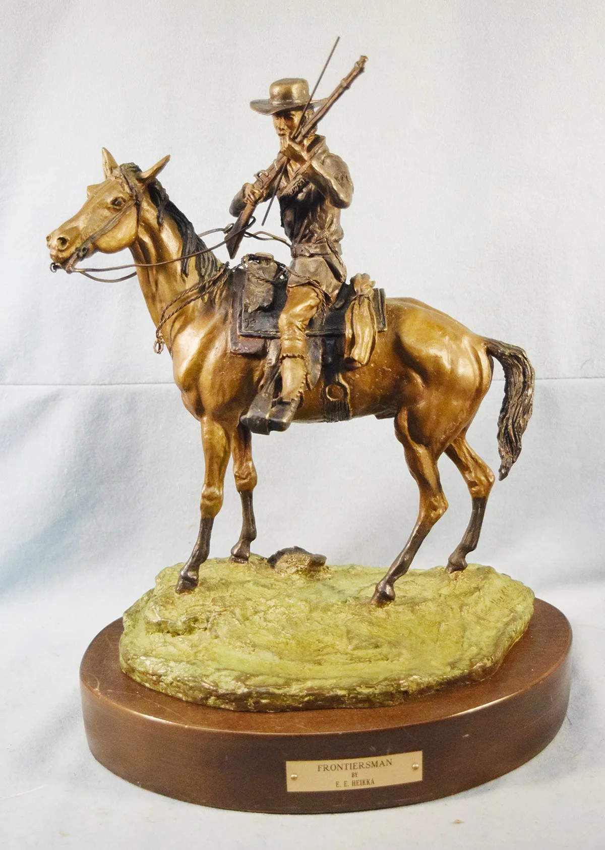 Heikka, Earl, bronze, The Frontiersman, #21/36, 14" x 11" x 7", wood base. In the 1930's Gerald Robinson acquired the model from Heikka. Robinson gifted the bronze to the C. M. Russell Museum and then it was cast by Classic Bronze.