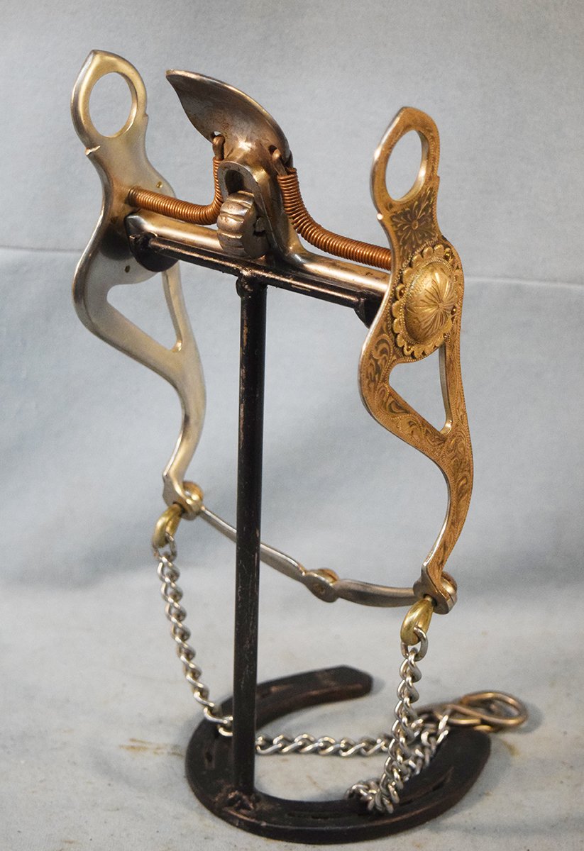 Les Garcia, Reno, NV, silver etched high port spade with cut outs and rein chains
