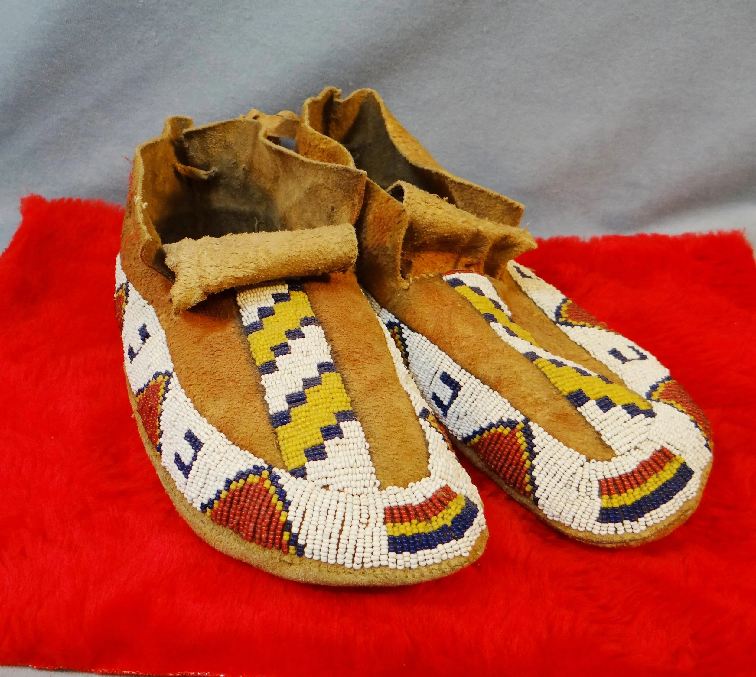 Blackfeet beaded moccasins, 10", sinew sewn, found by Marty Kelly in 1960, near Missouri River, Montana
