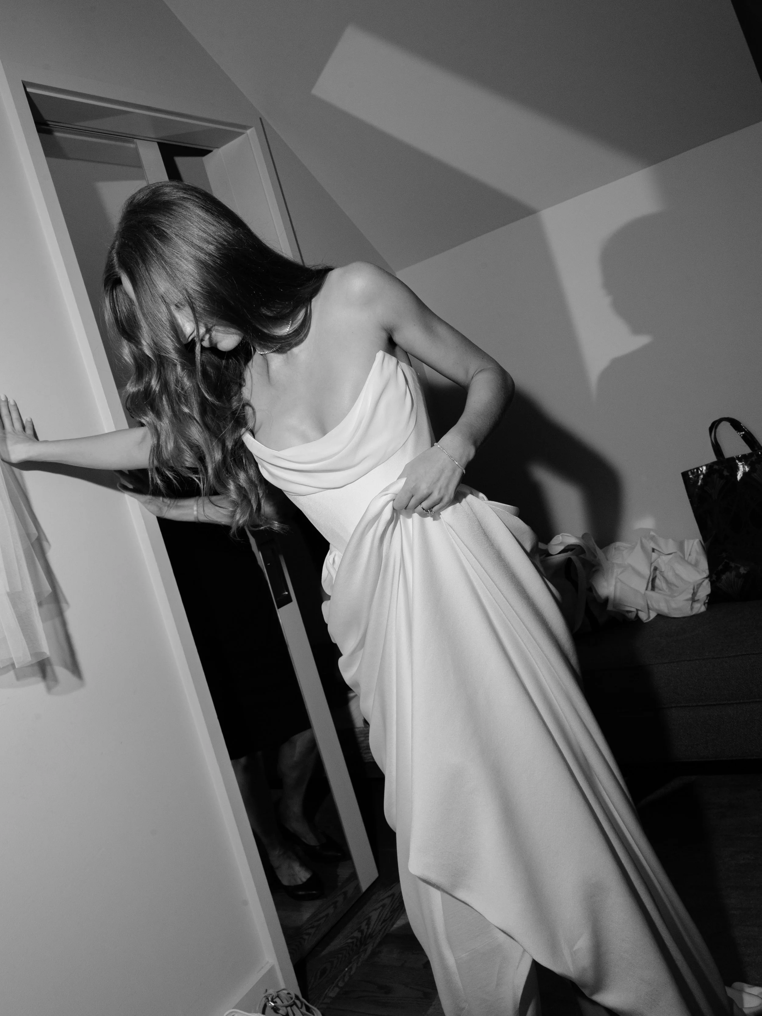 Bride wearing a Vivienne Westwood wedding gown with a sculptural editorial silhouette.