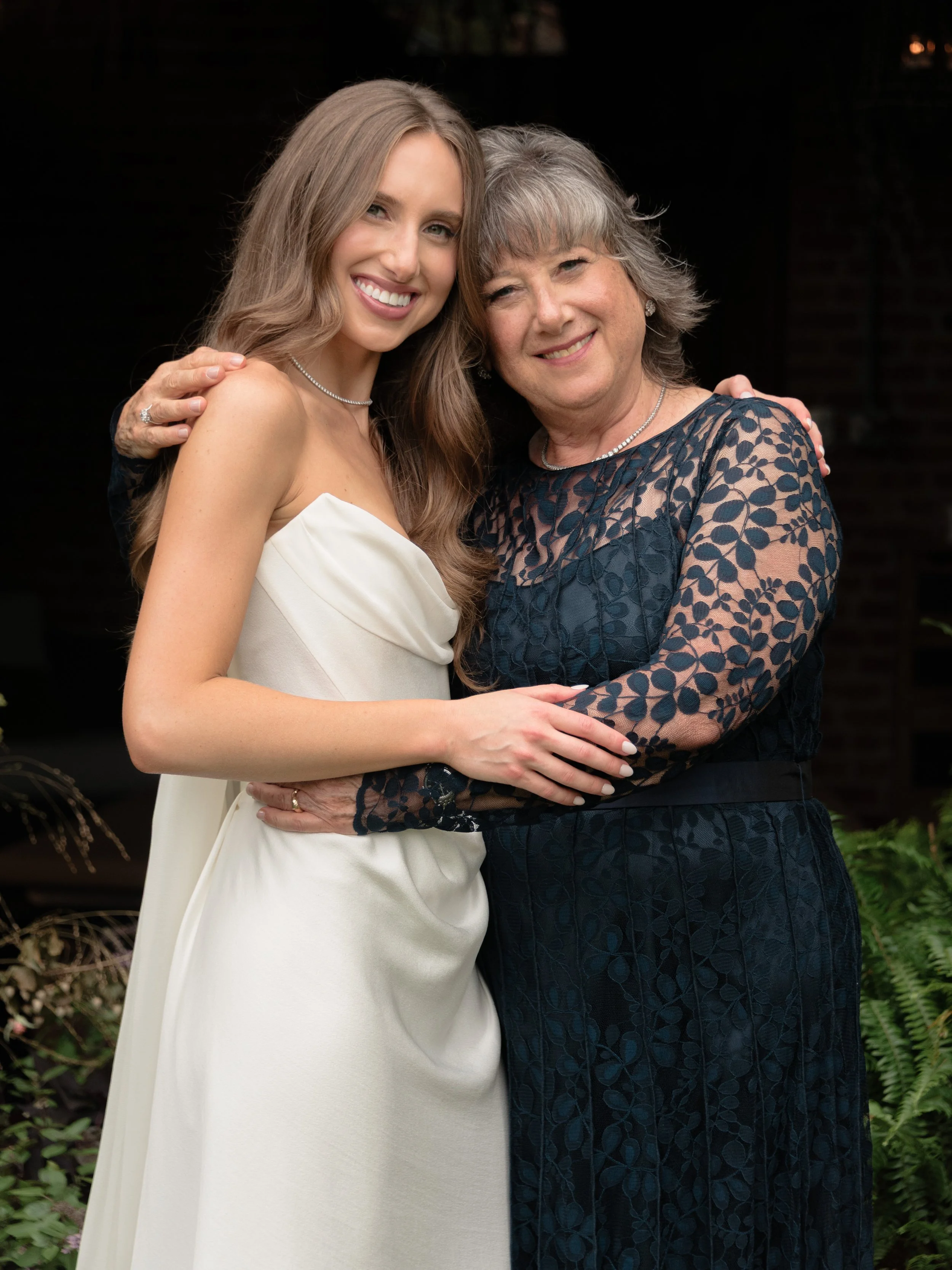 Jennie embraces her mother during family portraits at Blue Hill at Stone Barns in the Hudson Valley.