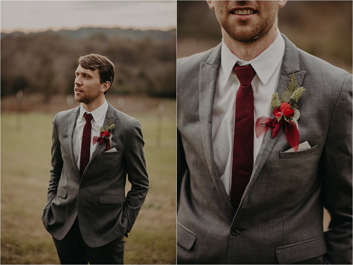  The groom wore a charcoal suit with a burgundy tie and tie clip  