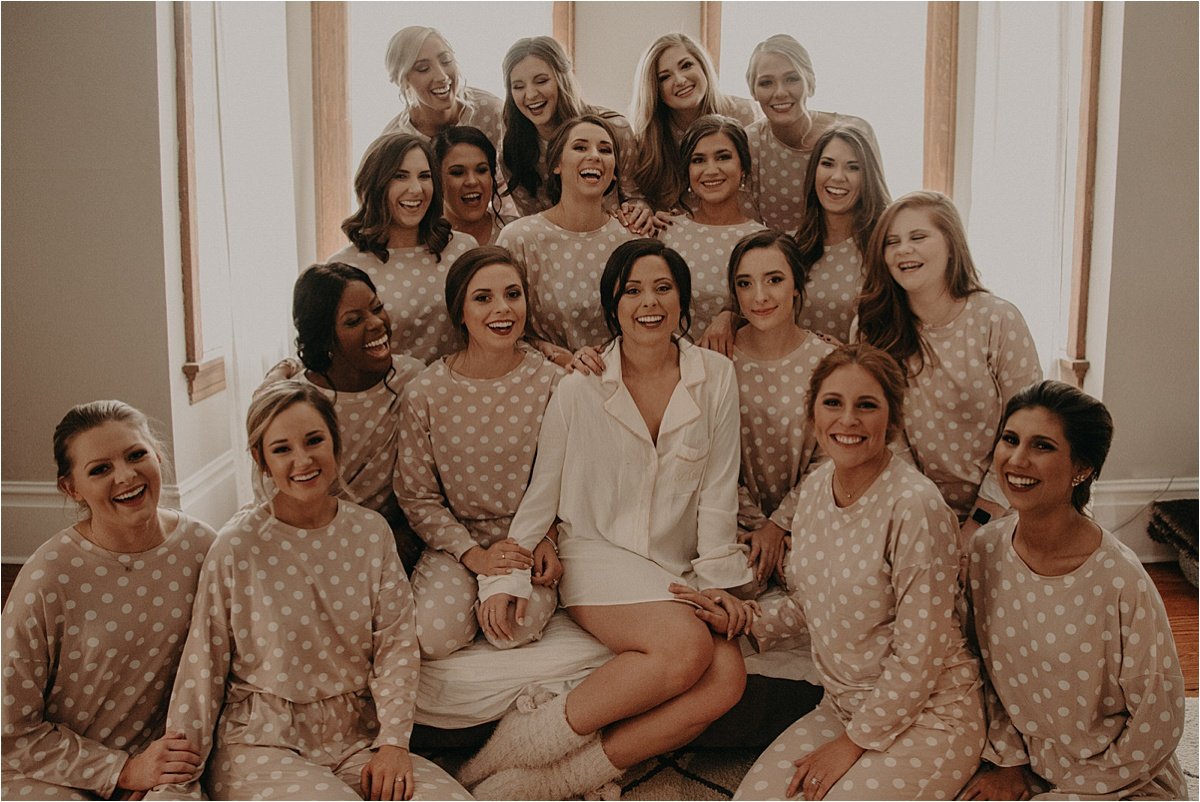 The bridesmaids wore matching brown and white polka dot pajamas