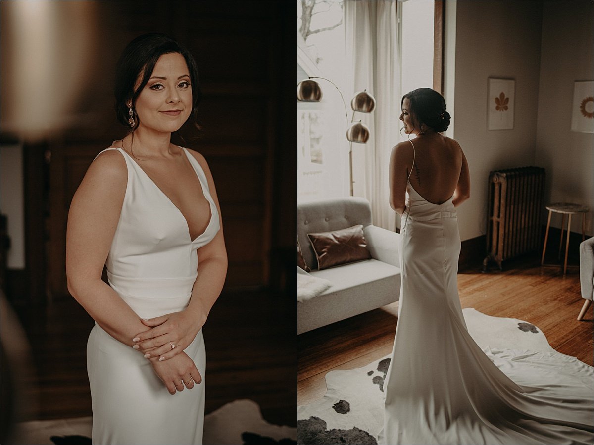 The bride shows off the plunging neck and backline of her satin Lela Rose wedding gown