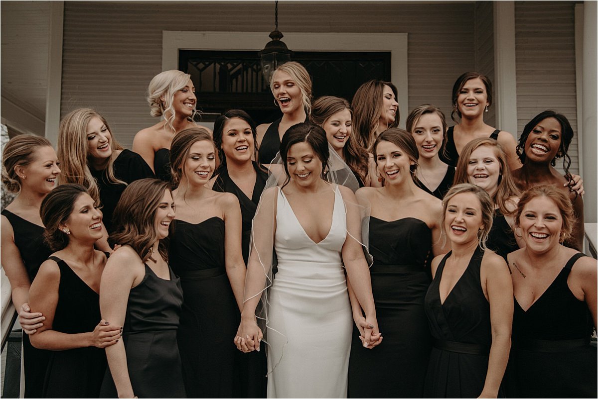 The bride and her bridesmaids are all smiles before heading to Patten Chapel