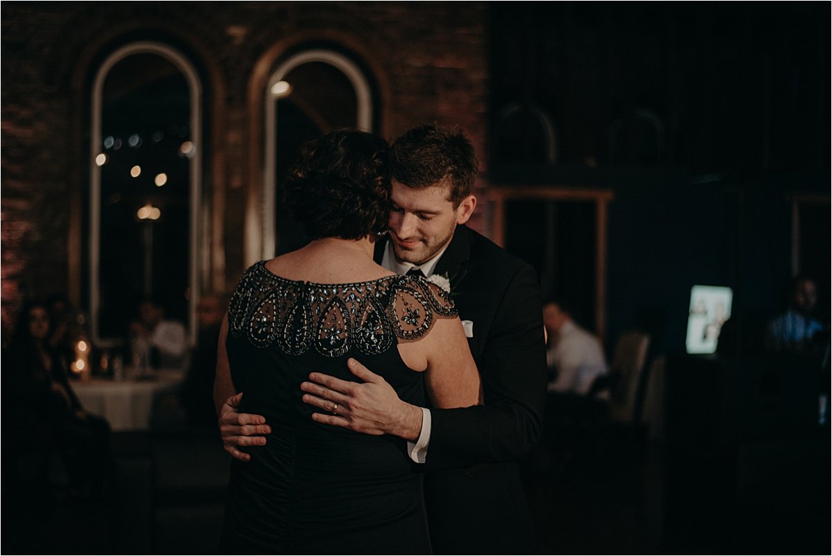 The groom dances with his mother