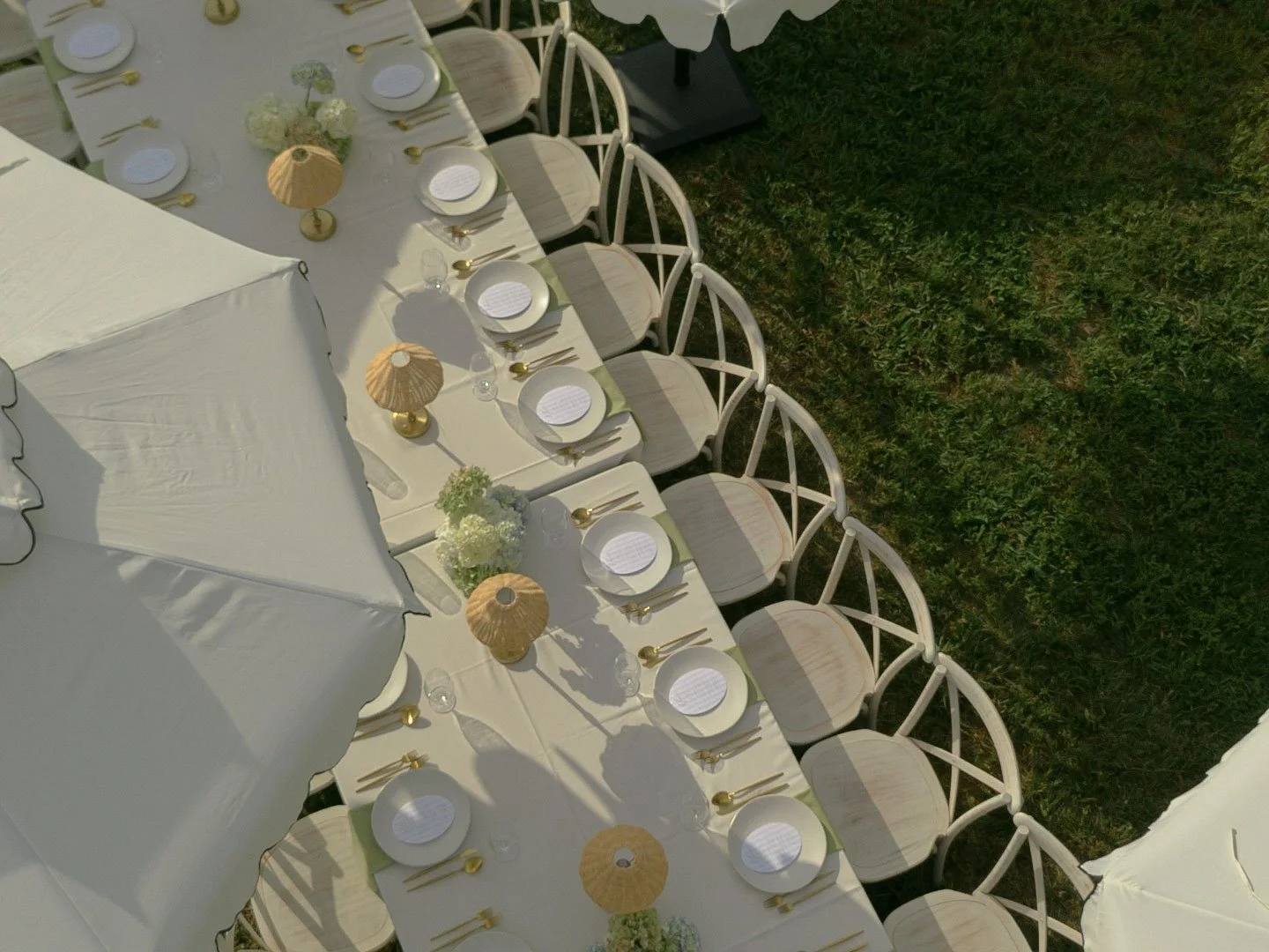 Jadyn and Jack&rsquo;s rehearsal dinner was set entirely outdoors, with long tables, soft greens, and just enough structure to let the setting speak for itself. It felt relaxed, thoughtful, and exactly in line with the weekend they were about to step