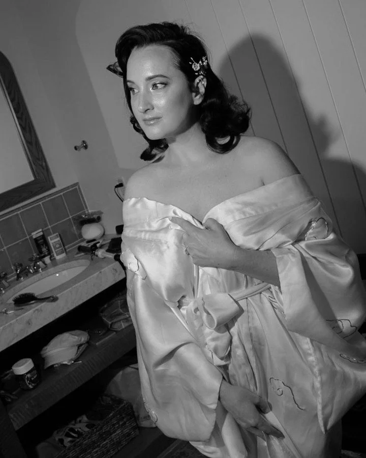 Lori and Morgan started the day getting ready in the city and ended it on a mountaintop, with snow falling during their vows. At some point, Lori pulled out a ukulele and played Morgan a song. It was simple, personal, and hard to forget.

#mountainel