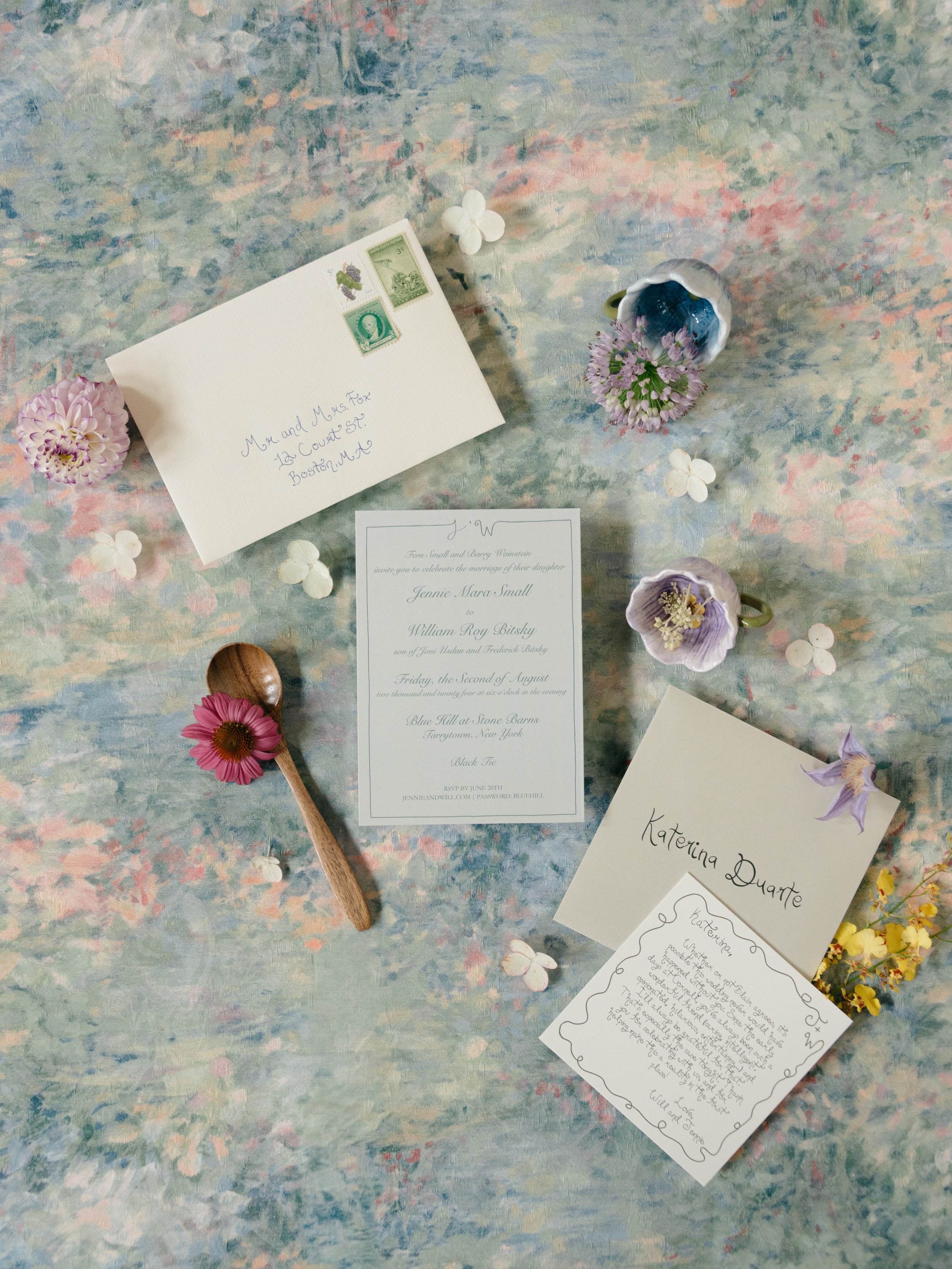 Editorial invitation details photographed on a summer wedding morning at Blue Hill at Stone Barns in Hudson Valley, New York.