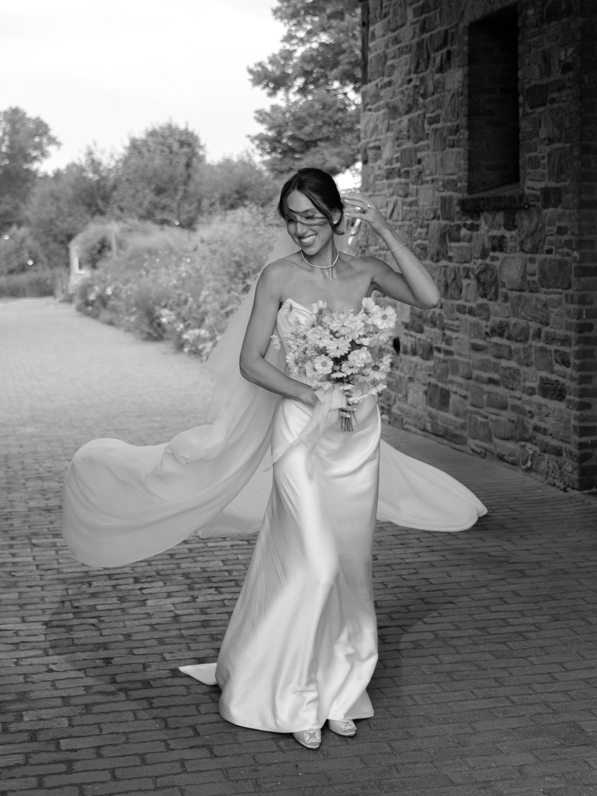 Editorial bridal portrait featuring a Vivienne Westwood gown during a Hudson Valley wedding celebration.