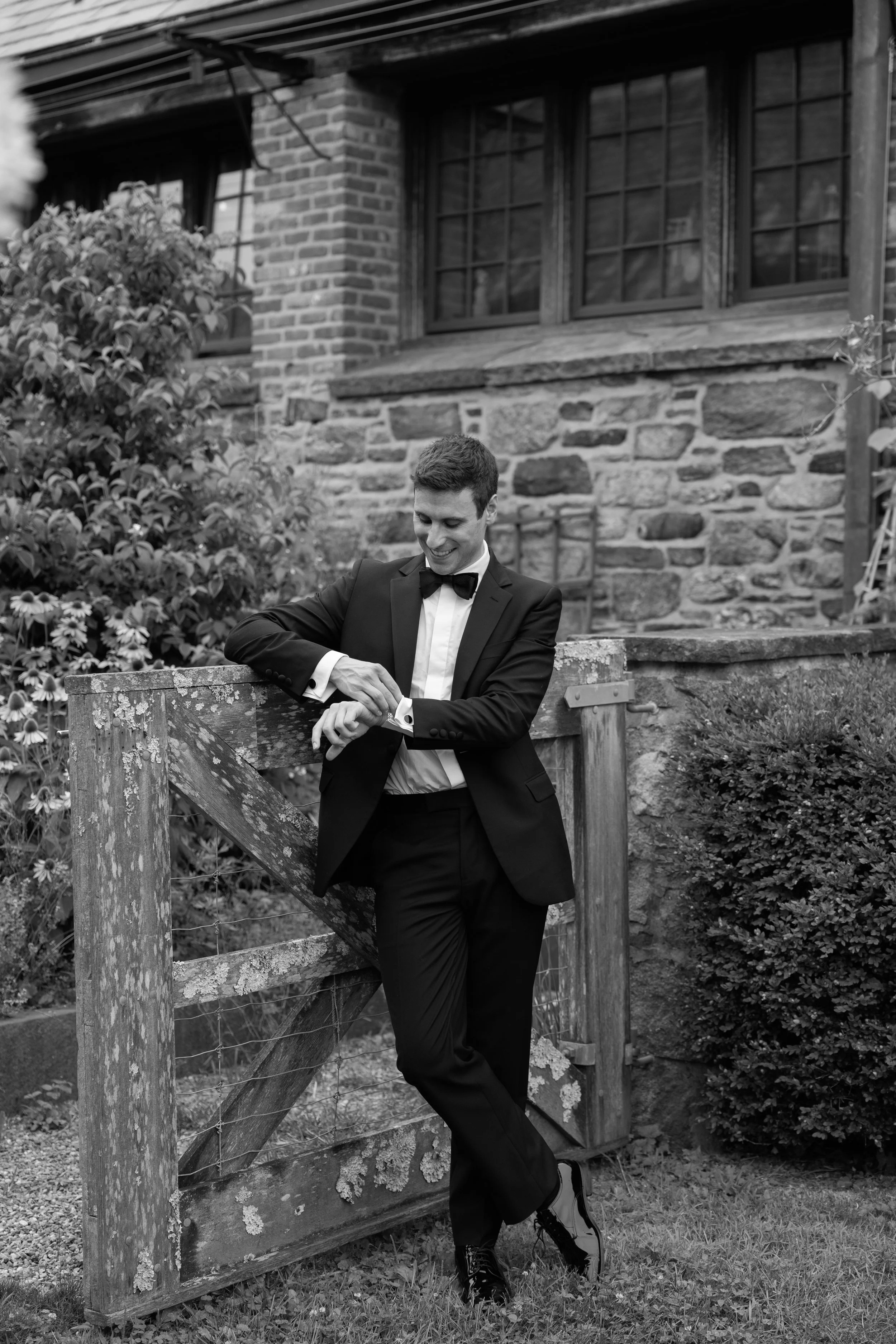 Editorial groom portraits at the historic Hudson Valley wedding venue known as Blue Hill at Stone Barns