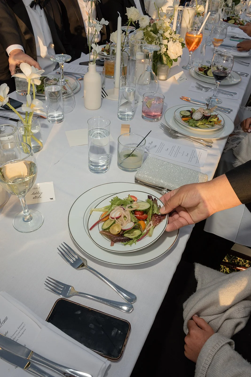 Plated dinner course served during an outdoor wedding reception at Goodstone Inn.