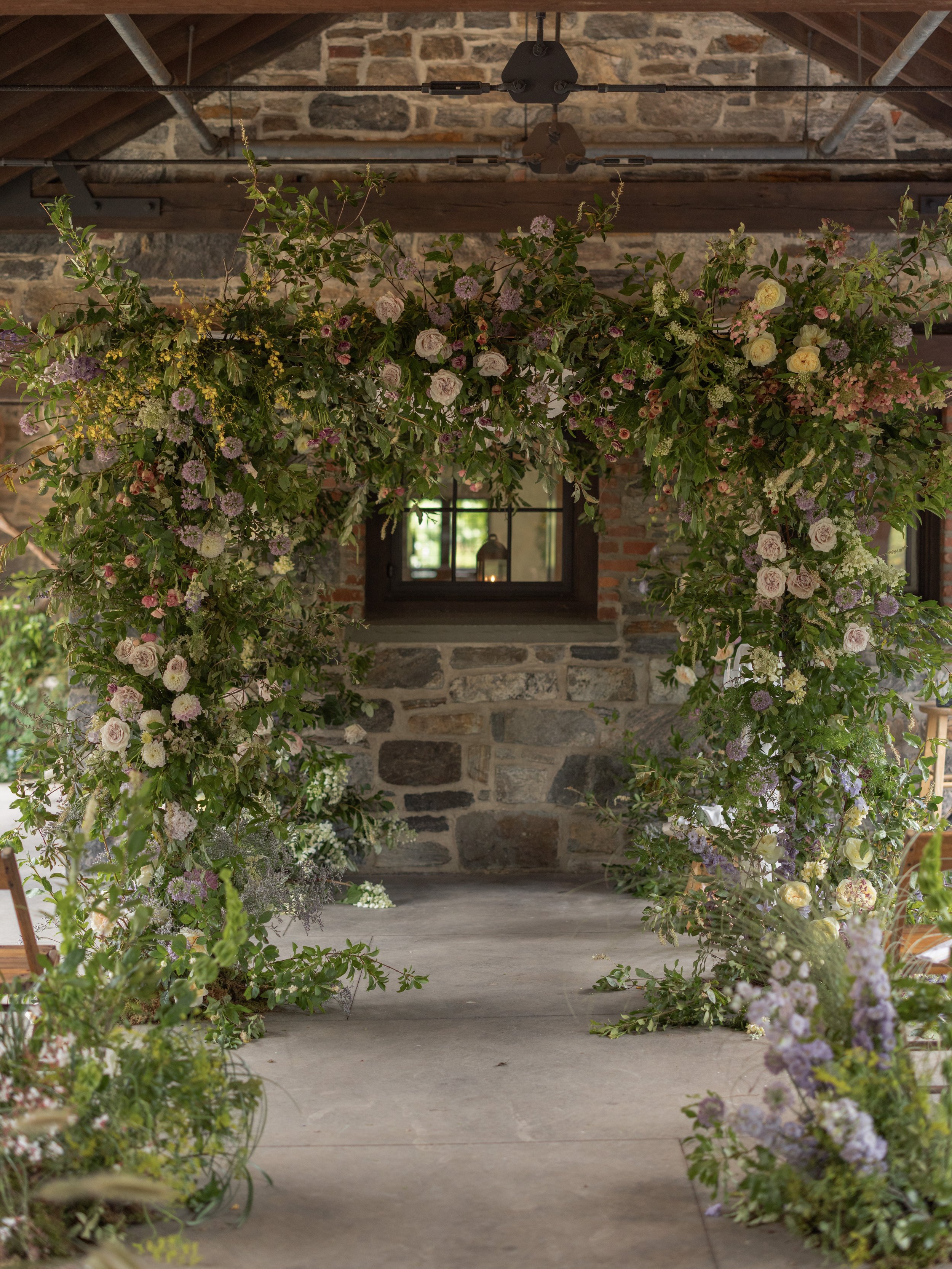 Floral design by Wild and Birch and event design by Mudari Creative bringing an organic, garden-inspired aesthetic to Blue Hill at Stone Barns.