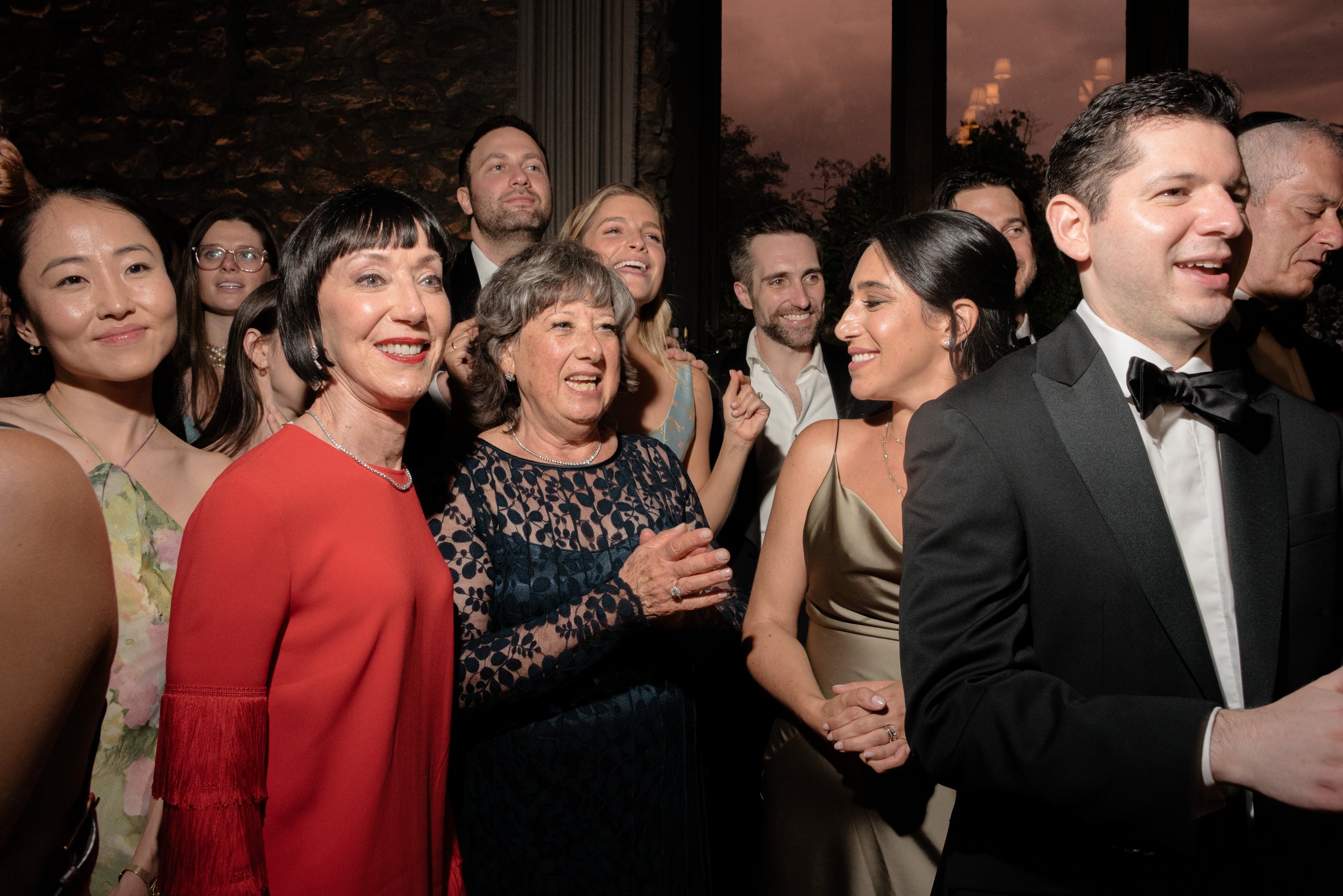 Friends and family crowd the dance floor during Jennie and Will’s Blue Hill at Stone Barns reception.