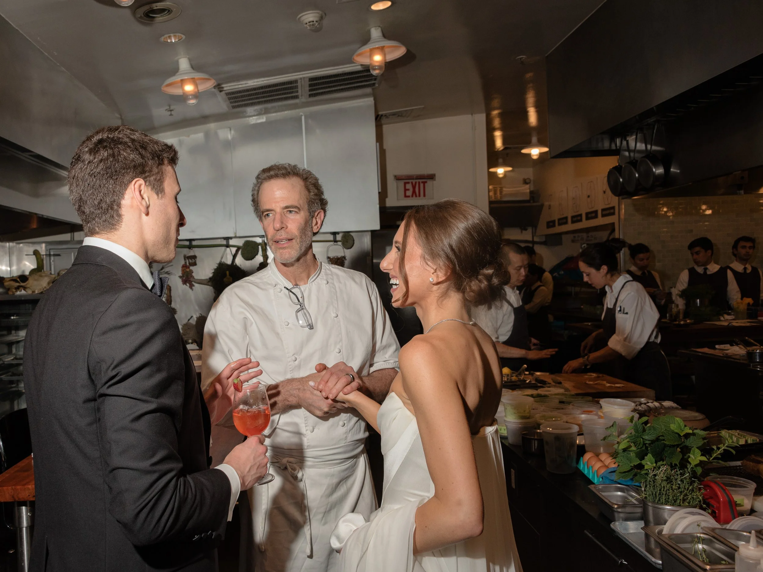 Jennie and Will speak with Chef Dan Barber of the Blue Hill culinary team during their wedding dinner experience.