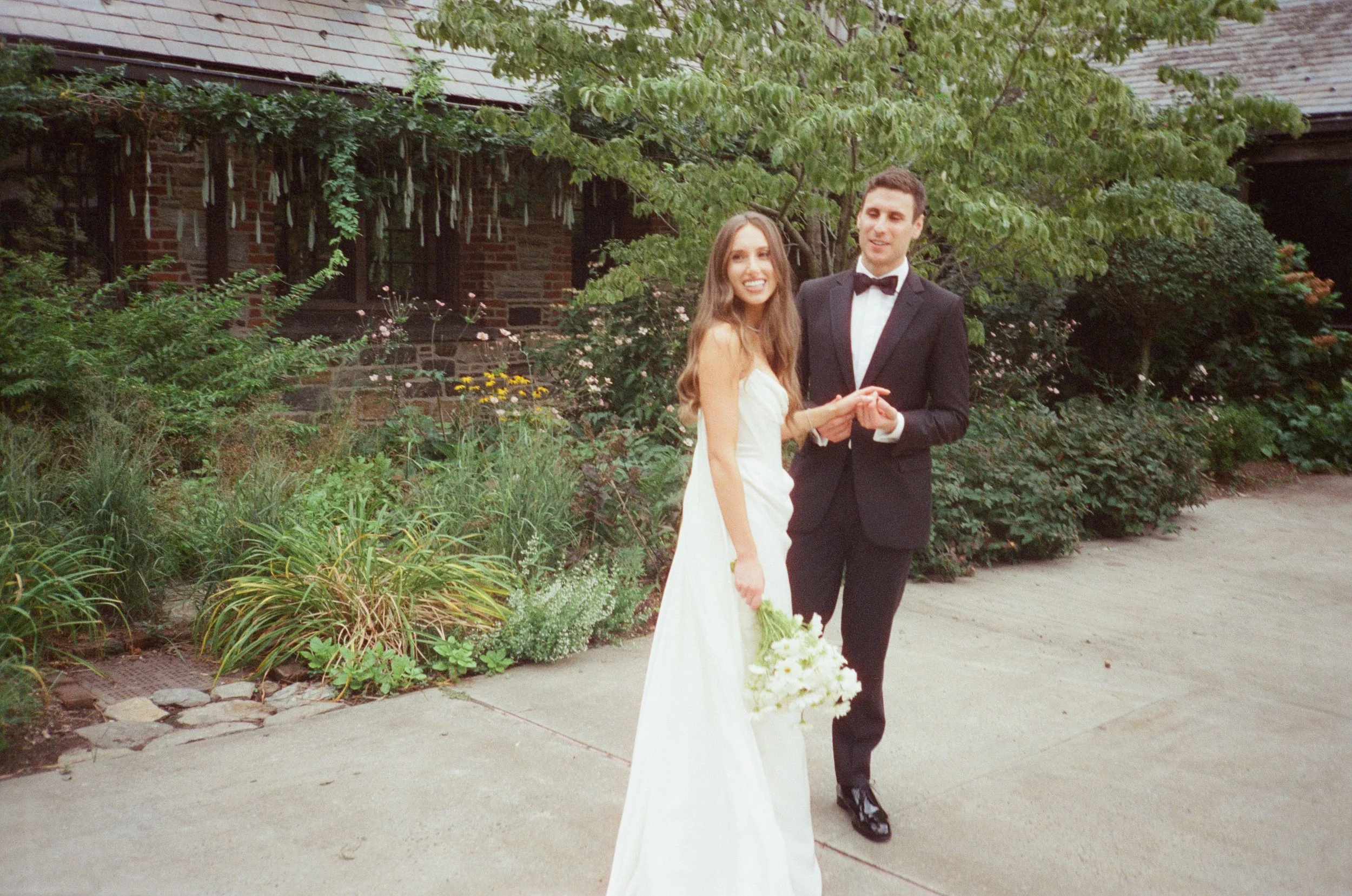 Candid film photos of the bride and groom on their wedding day at Blue Hill at Stone Barns as captured by Taylor English Photography
