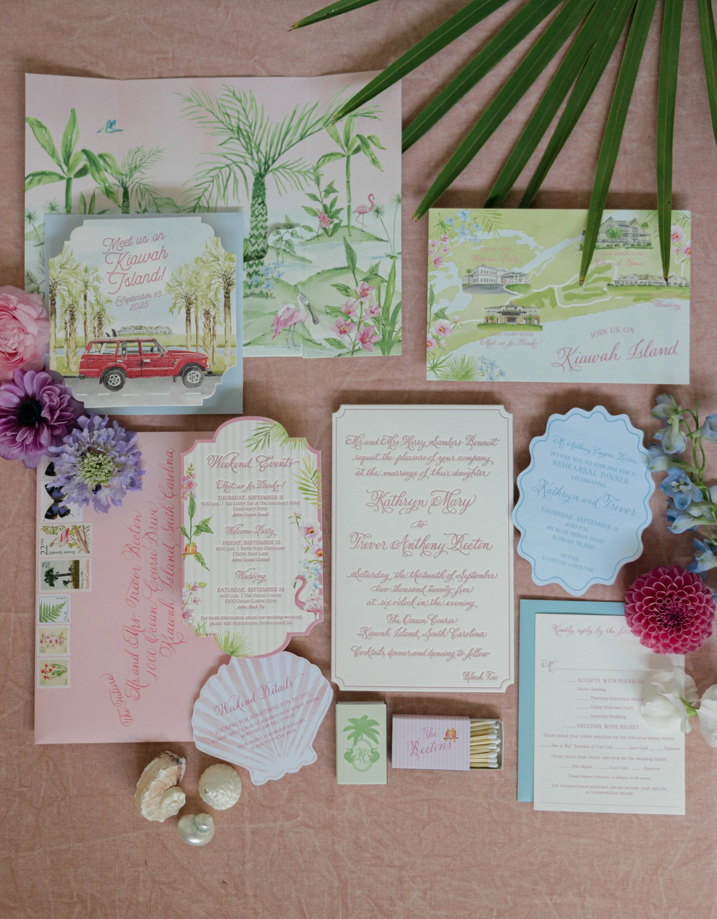 Tropical-inspired wedding invitation suite by Carly Creative Co. featuring illustrated Kiawah Island scenery, a vintage red car, scalloped stationery, and colorful floral details.