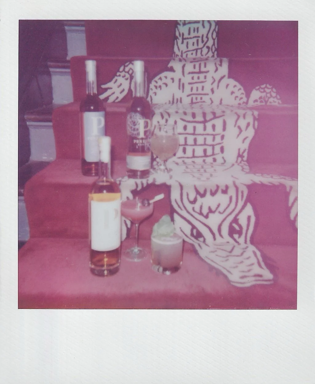 Film photograph of styled cocktail details and bar elements, blending editorial composition with the textures and atmosphere of a commercial branding event for Garden & Gun Magazine at The Chloe in New Orleans, Louisiana. 