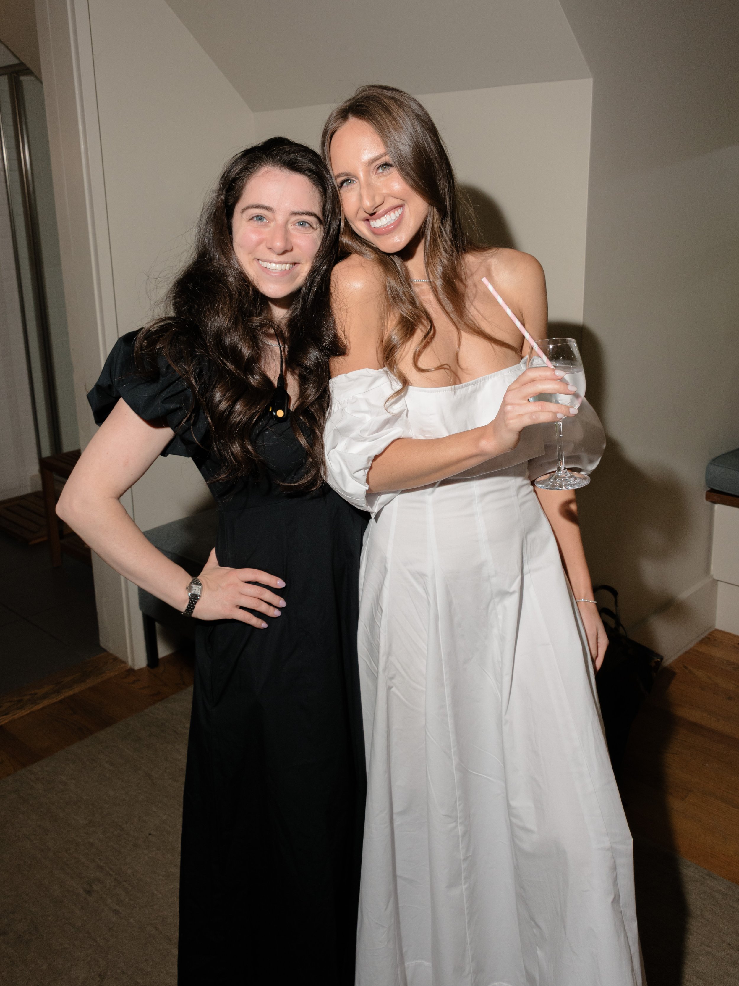 Wedding planner Olivia of Mudari Creative poses with her bride before she gets ready in the bridal suite at Blue Hill at Stone Barns in the Hudson Valley. 
