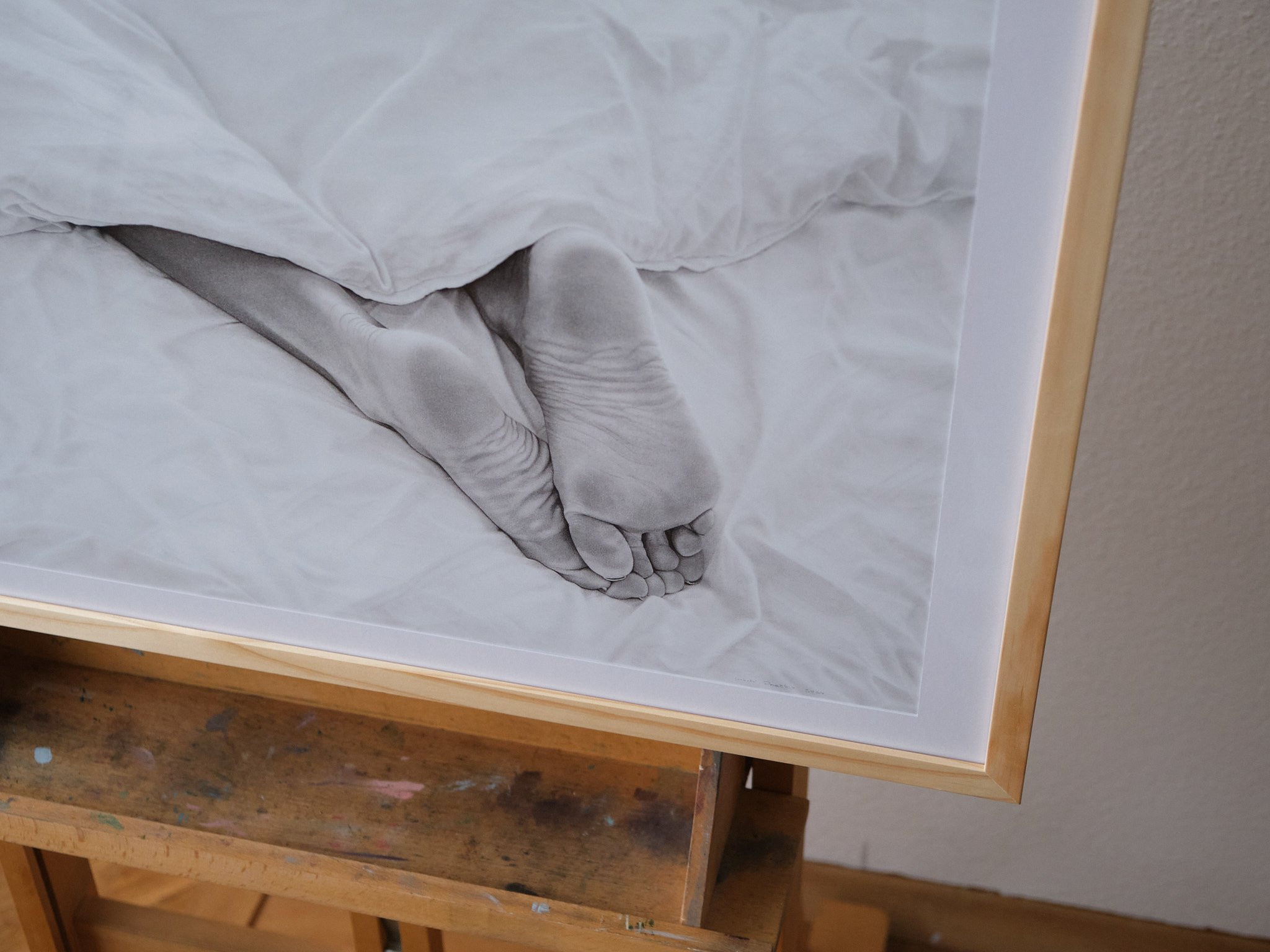 close up detail of framed printed artwork made by lukas priecko