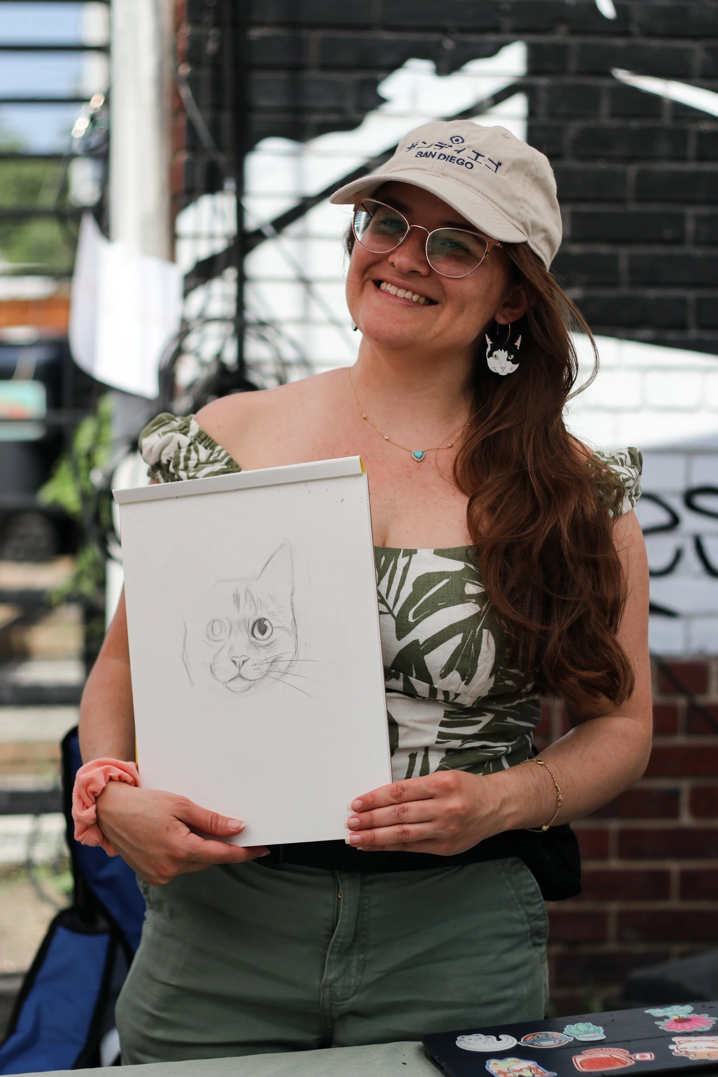 La Coop Artisan Market event, live painter