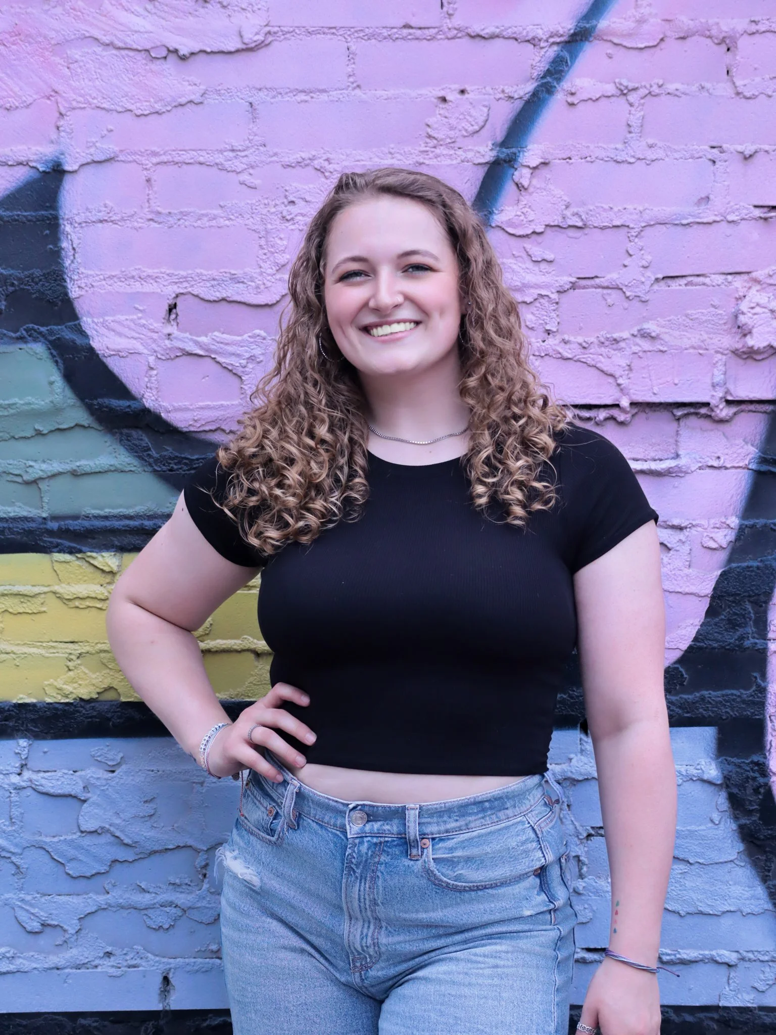a woman posing for a photo in Deep Ellum, Dallas, Texas