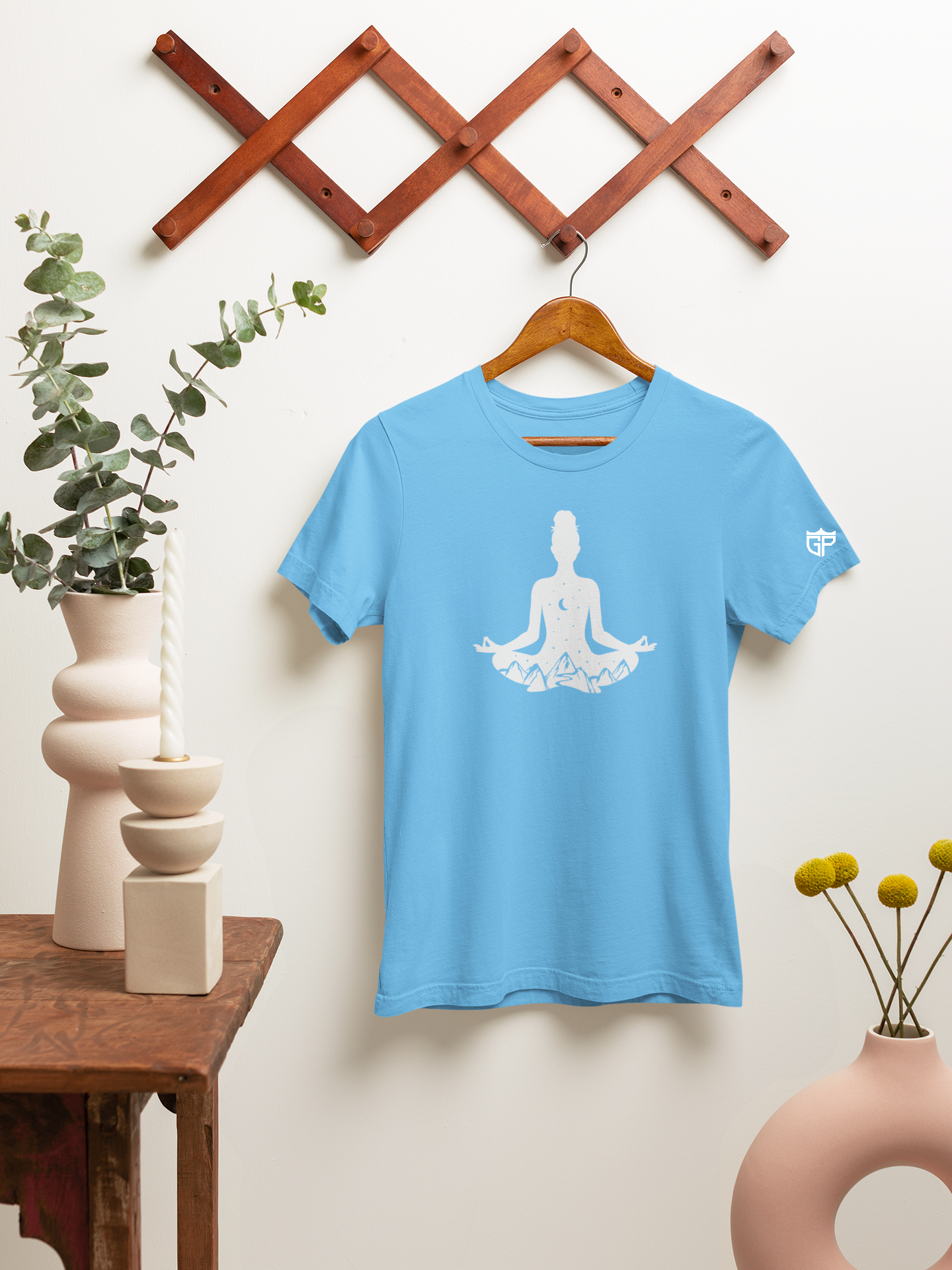 mockup-of-a-bella-canvas-t-shirt-on-a-hanger-featuring-a-rustic-setting-m23495.png