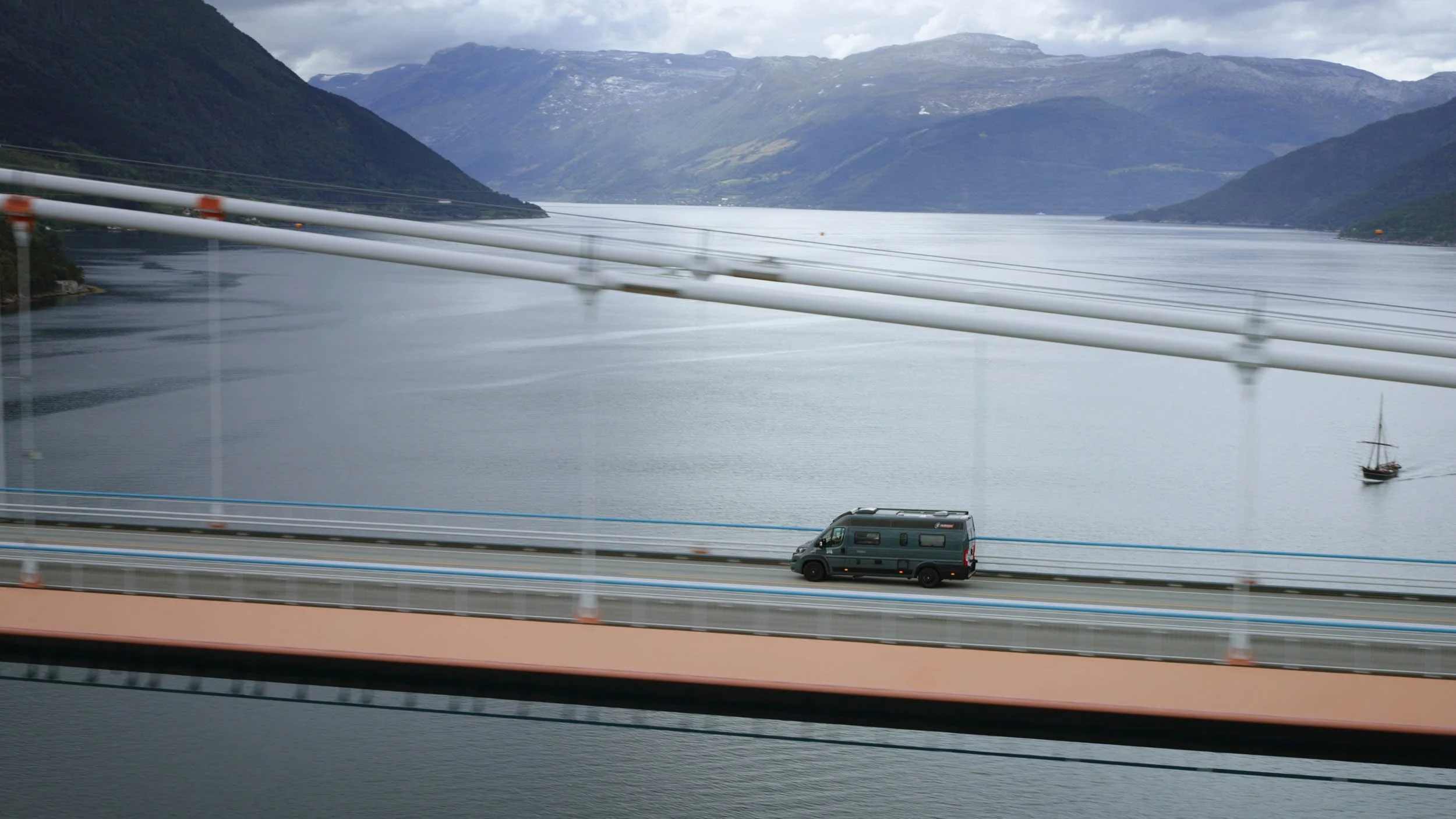 Car driving over Hardanger bridge Western Norway