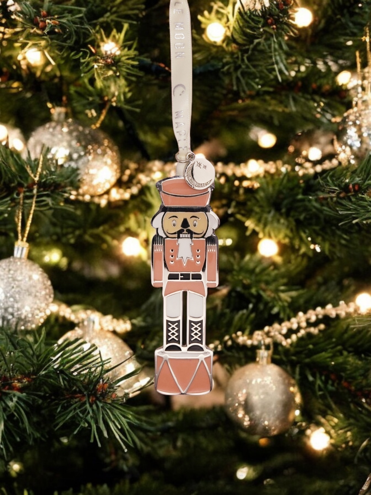 PINK NUTCRACKER WITH BACKGROUND.png