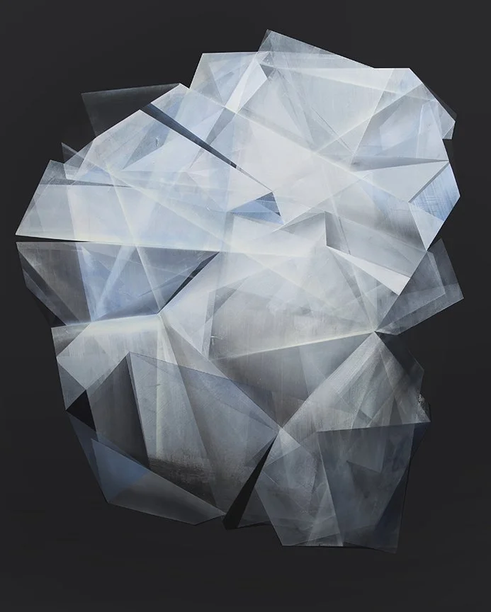 Abstract image of a large, multifaceted diamond against a black background.