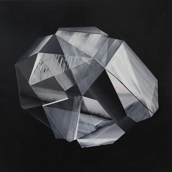 A geometric, crystalline sculpture with sharp edges and reflective surfaces, set against a black background.