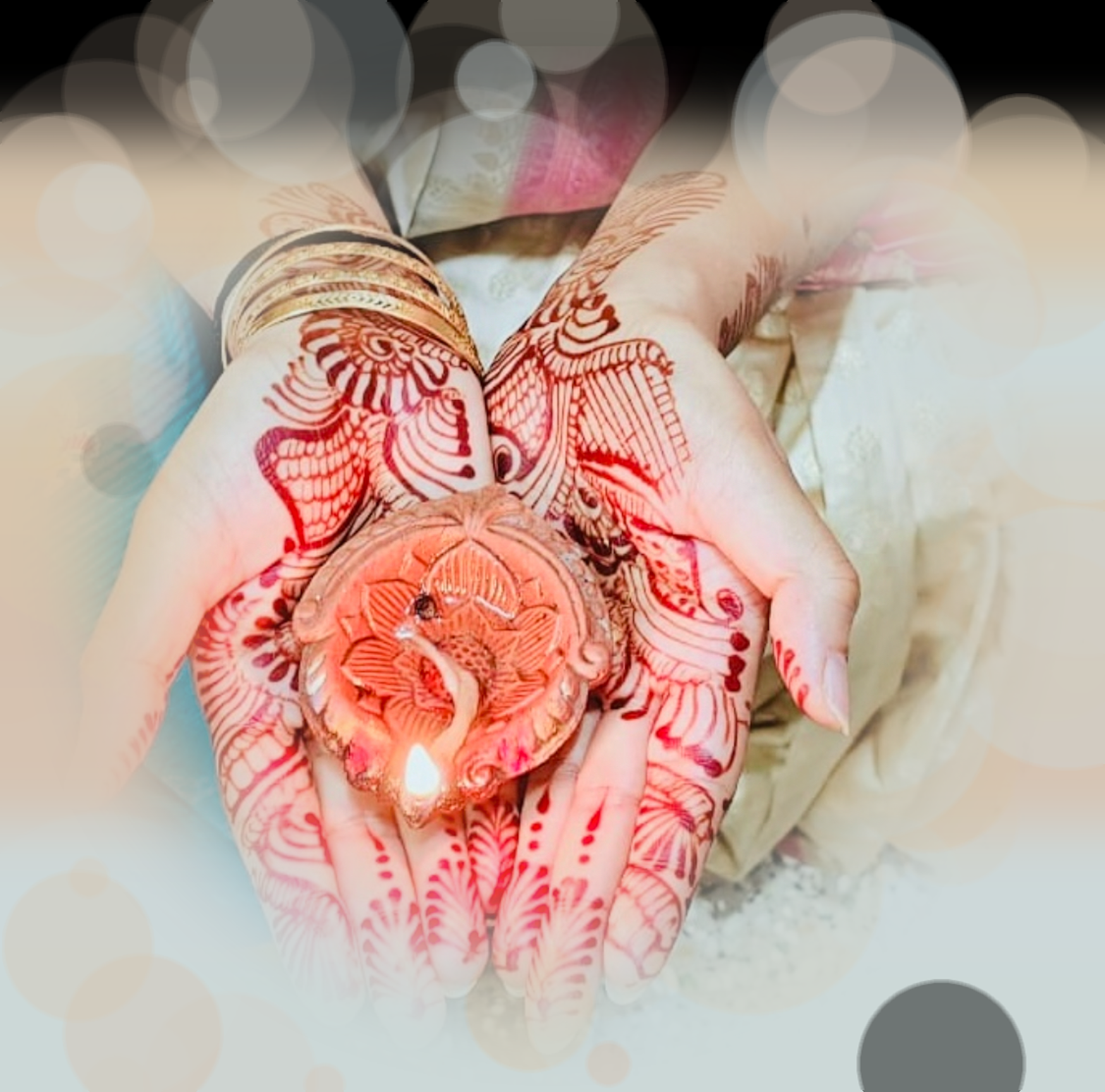 Image of open hands with henna tattoos