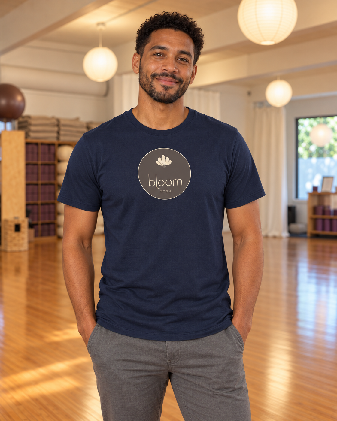 Bloom Everyday Tee in Navy, shown in the Bloom Yoga studio