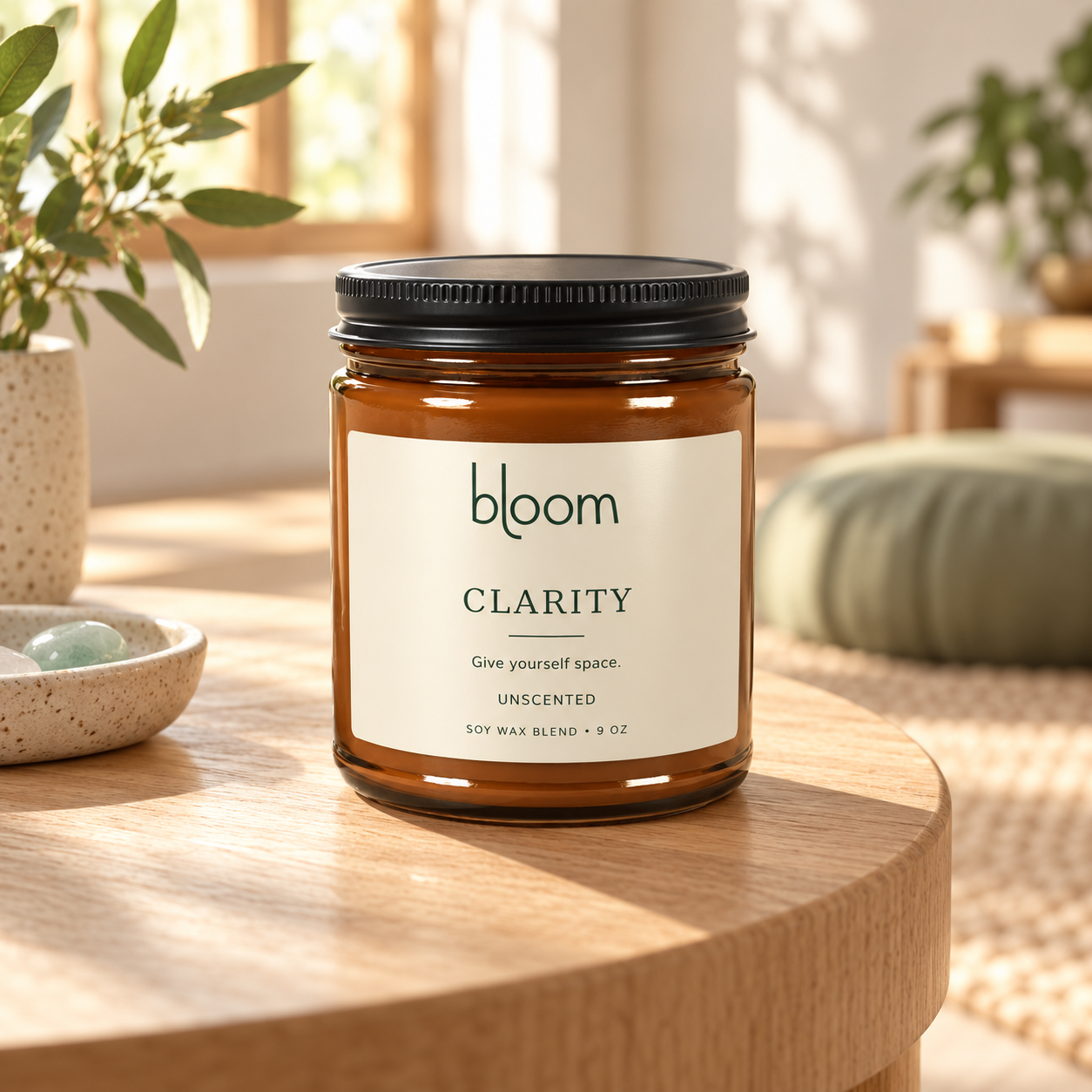 Bloom Clarity 9 oz unscented candle styled in a calm meditation setting.