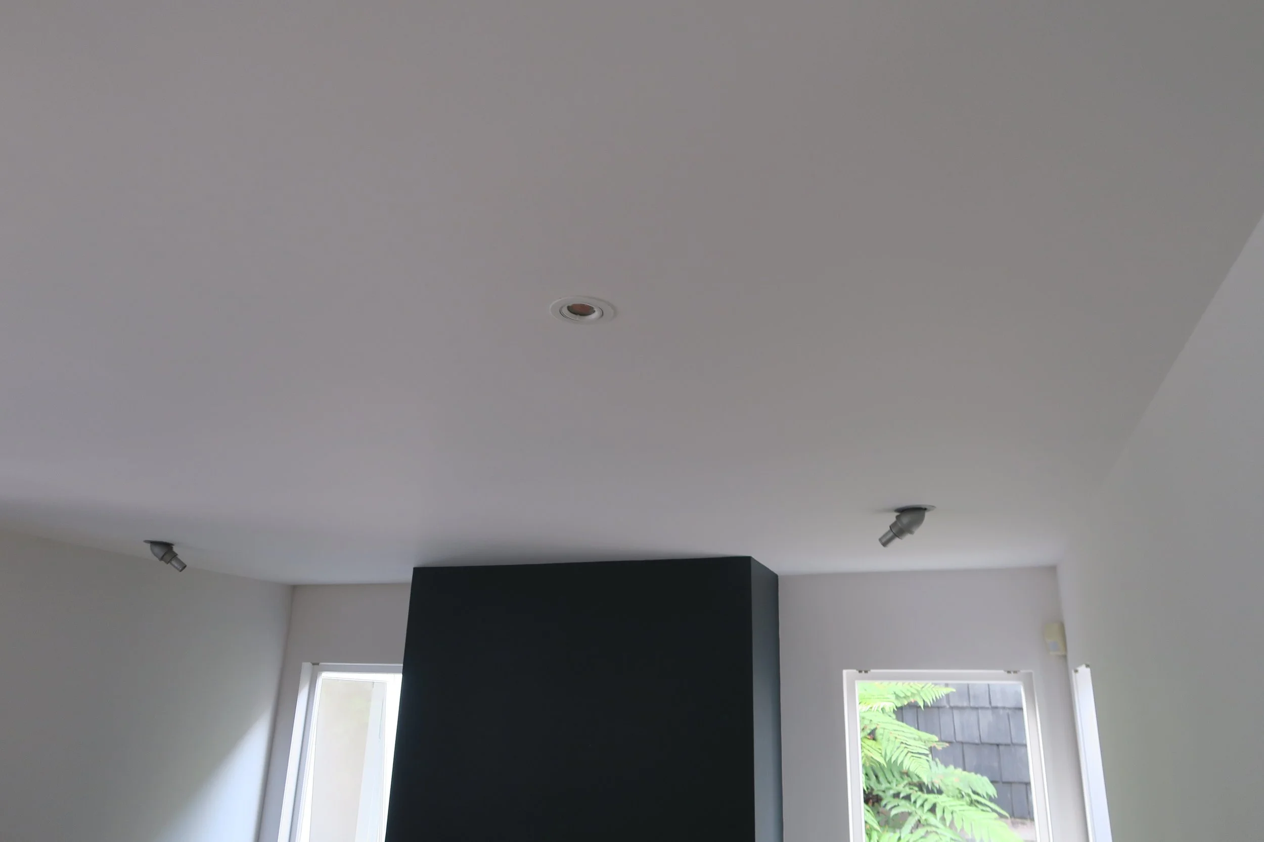 Line work on feature fireplace, Porter's Paints, Parnell