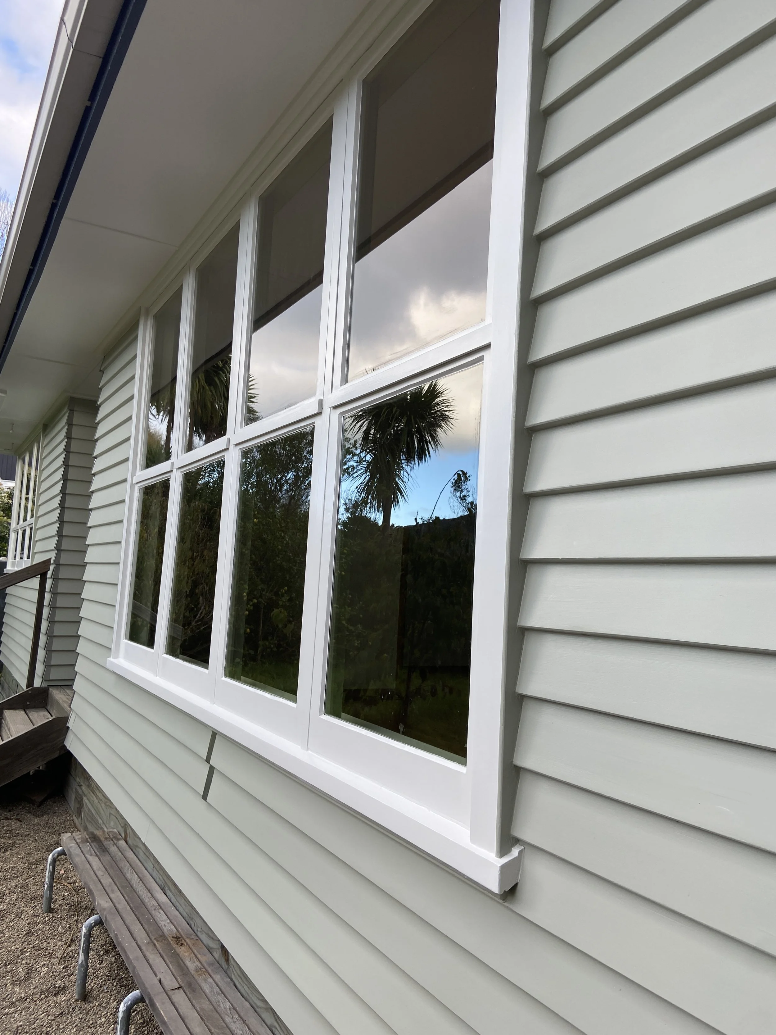 Weatherboard, timber joinery, soffit and fascia detailing