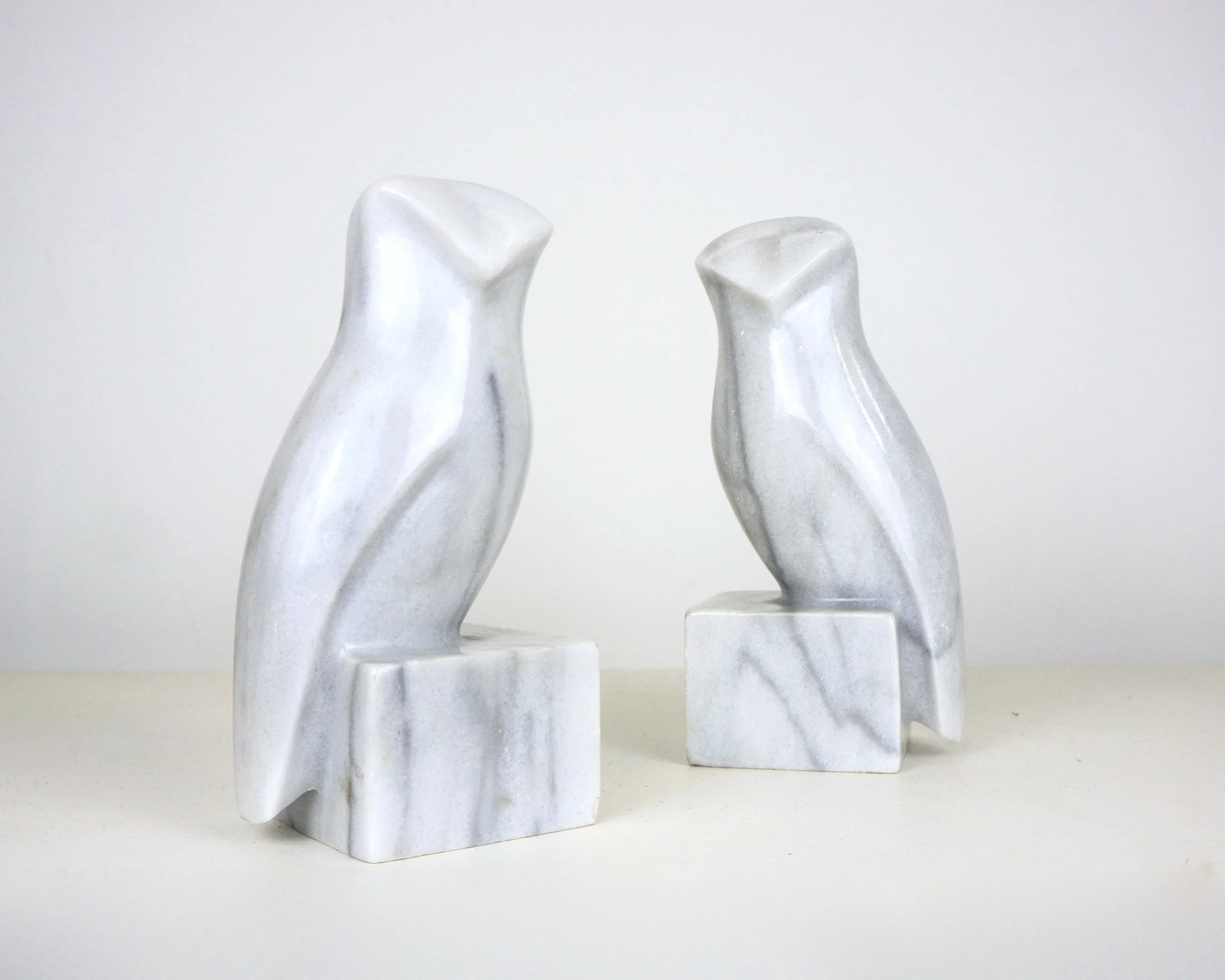 A PAIR OF MARBLE OWL BOOKENDS