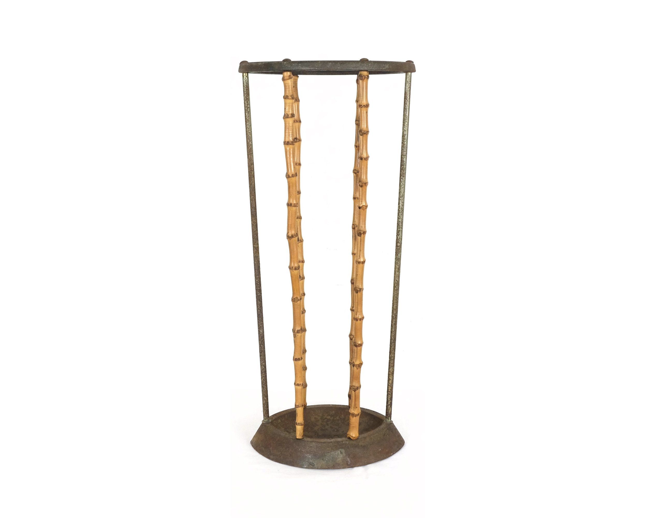 AN IRON AND BAMBOO STICK STAND