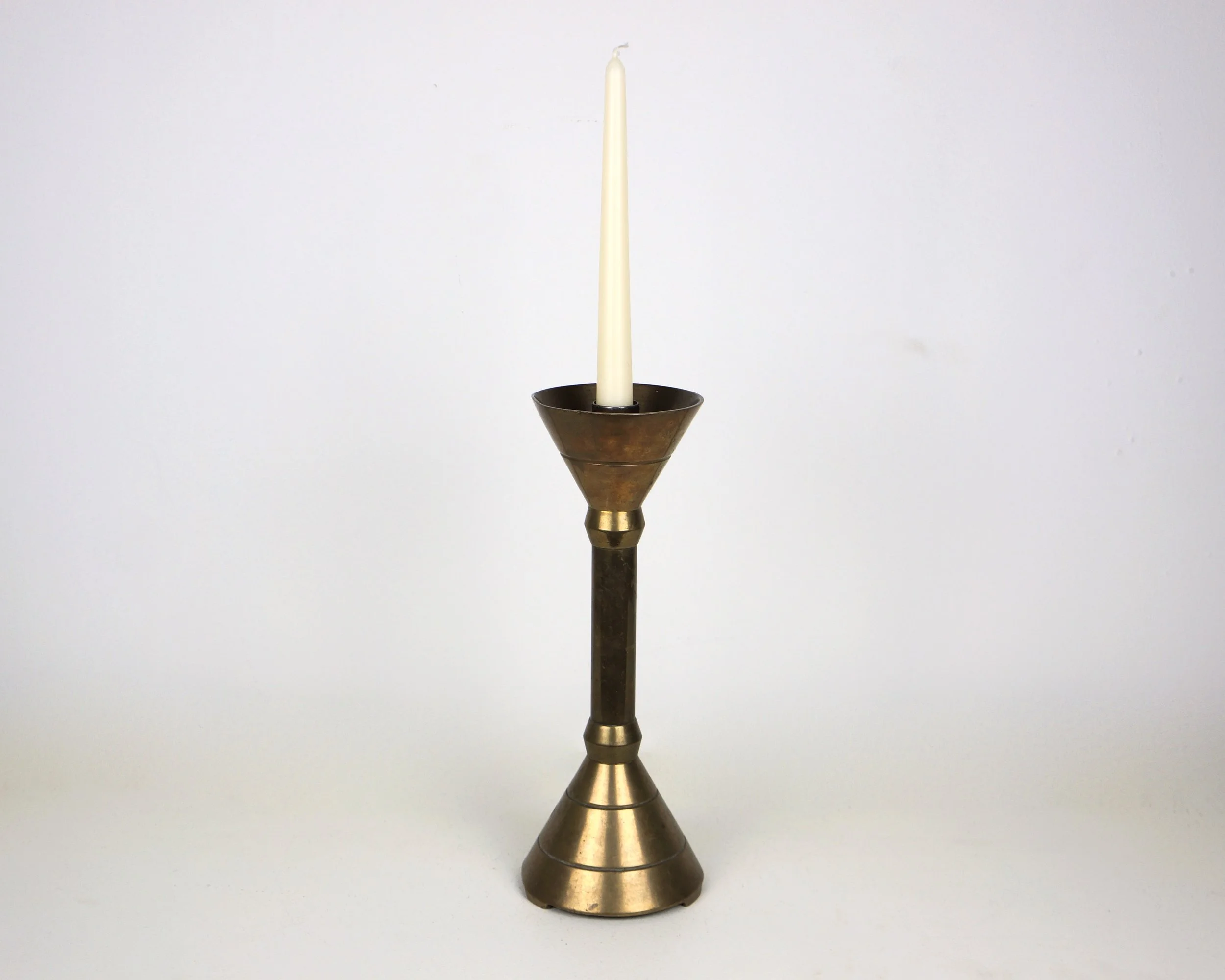 A FRENCH BRASS CANDLESTICK