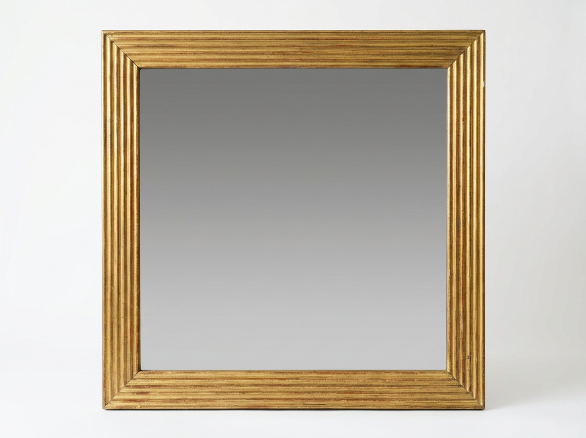 A 19TH CENTURY REEDED GILTWOOD MIRROR
