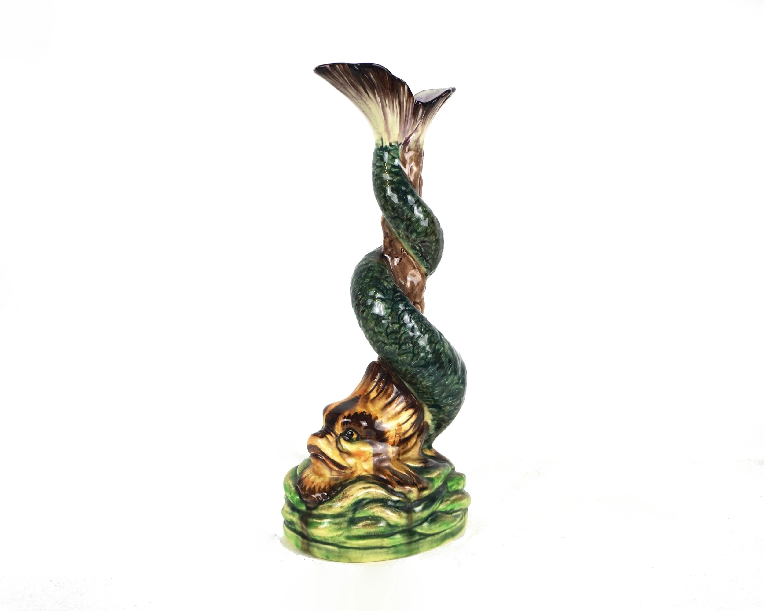 A VICTORIAN MAJOLICA DOLPHIN CANDLESTICK
